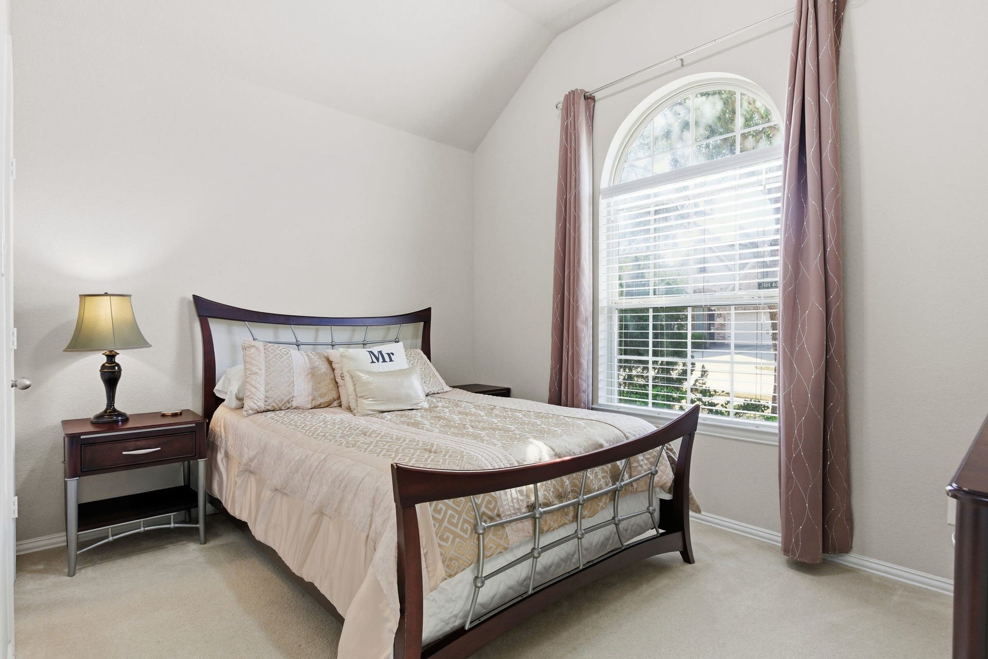 First secondary bedroom as you walk in. Perfect for guests that seek privacy.