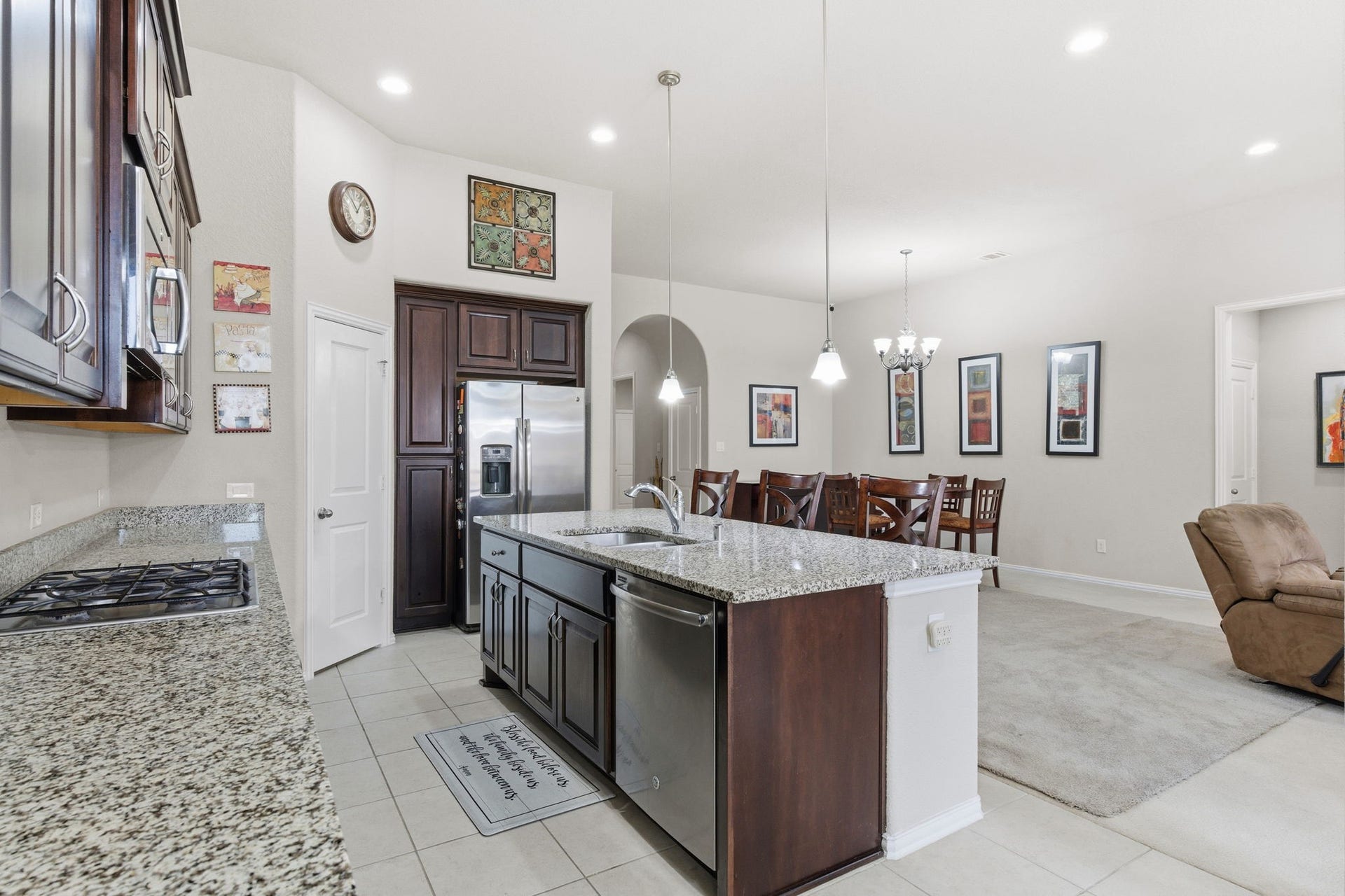 Beautiful kitchen features granite counter tops and massive kitchen island perfect for family gatherings!