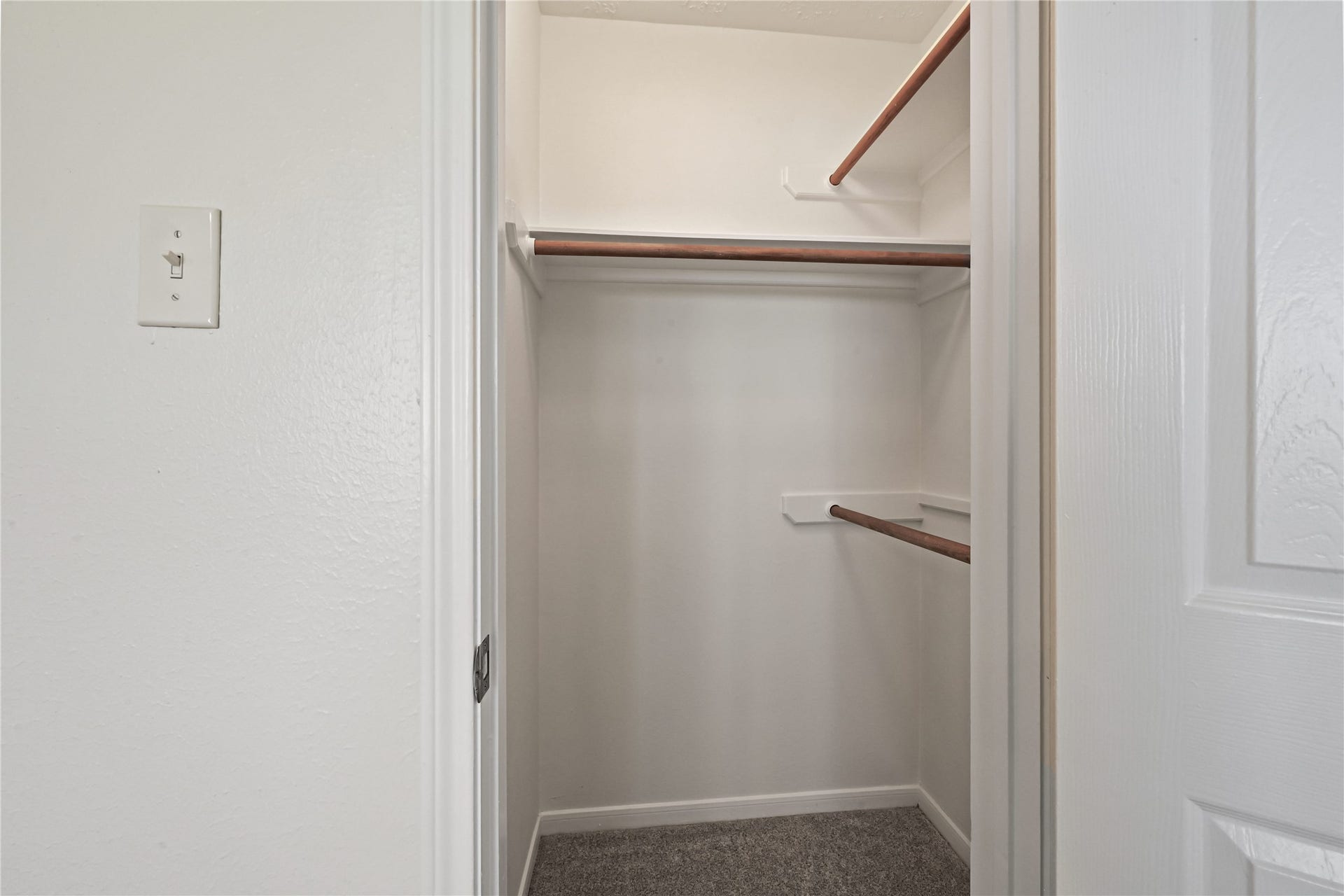 2607 Sailboat Drive, Houston, TX 77058 Spacious walk-in closet with ample hanging space and neutral tones for a clean, organized look.