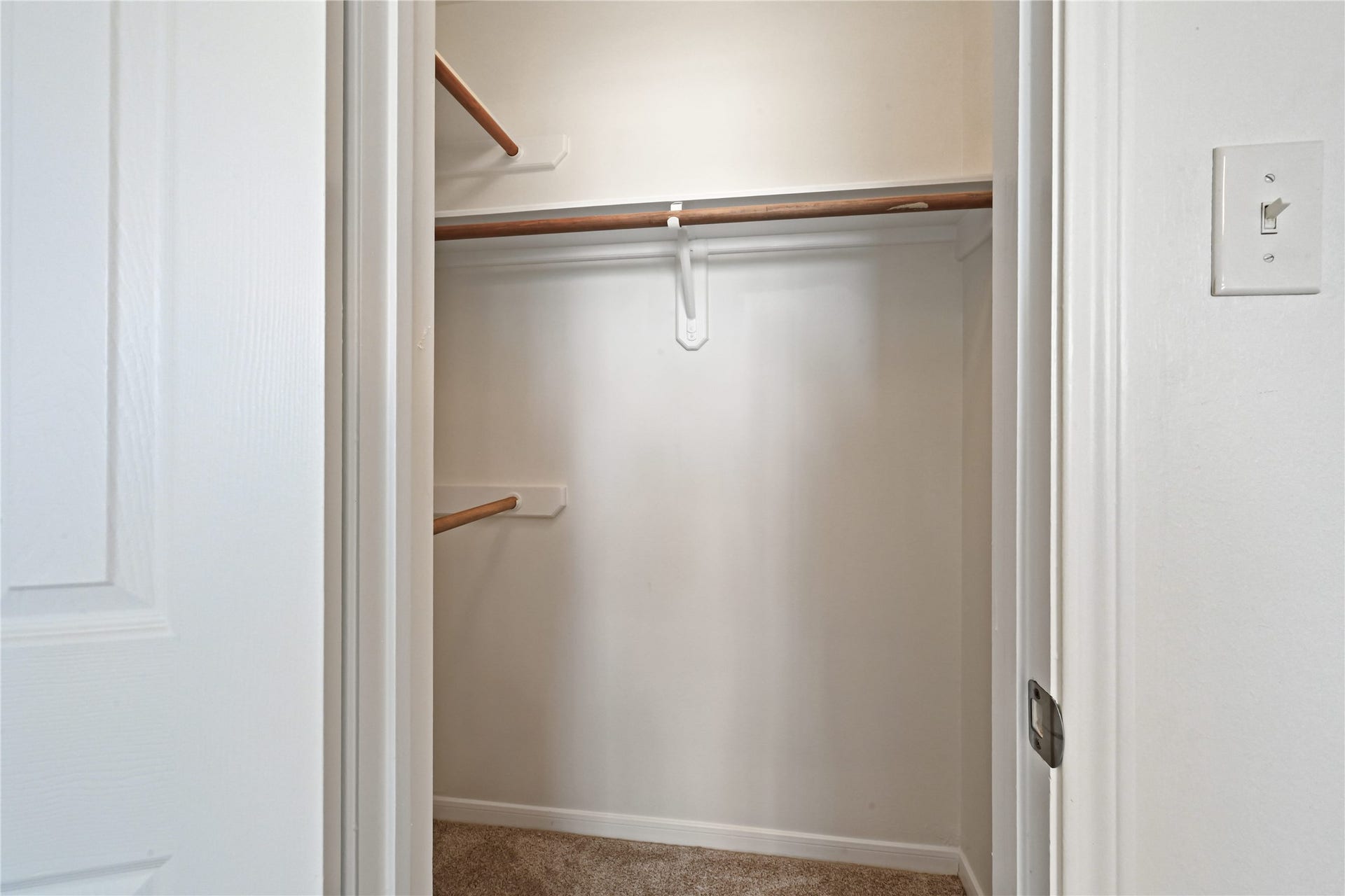 2607 Sailboat Drive, Houston, TX 77058 Spacious walk-in closet with ample shelving and hanging space, perfect for organizing your wardrobe.