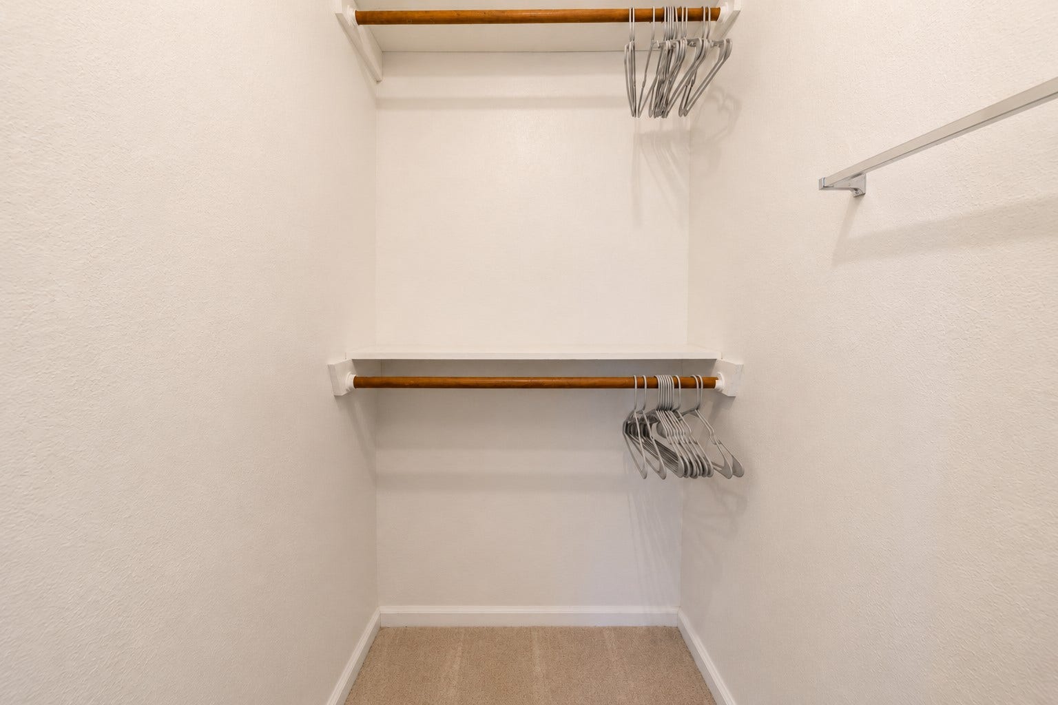 One of two nice sized walk-in closets for your primary bedroom.