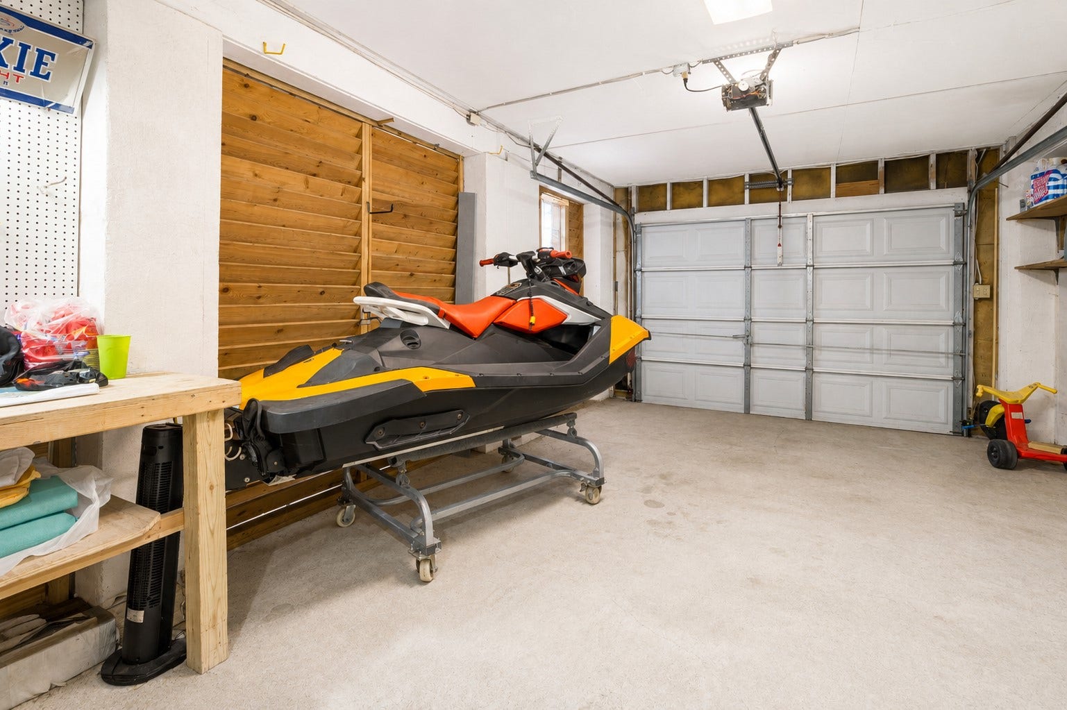 Jet ski included for recreational water activities.