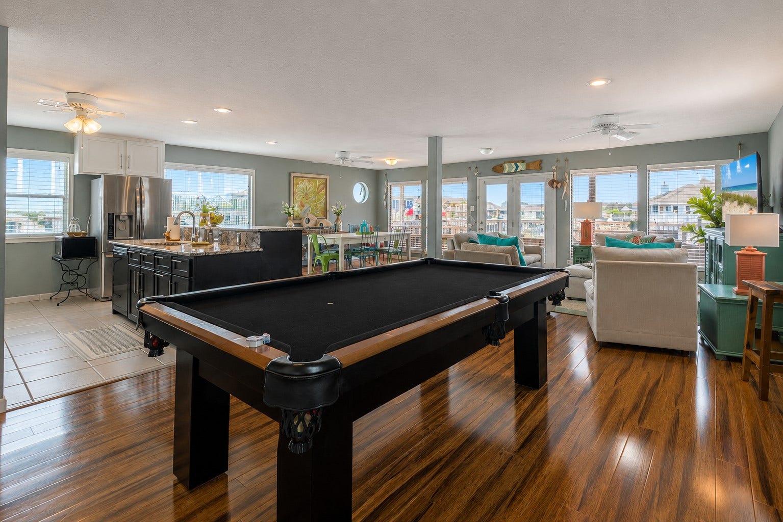 Abundant windows and natural light throughout the main areas.