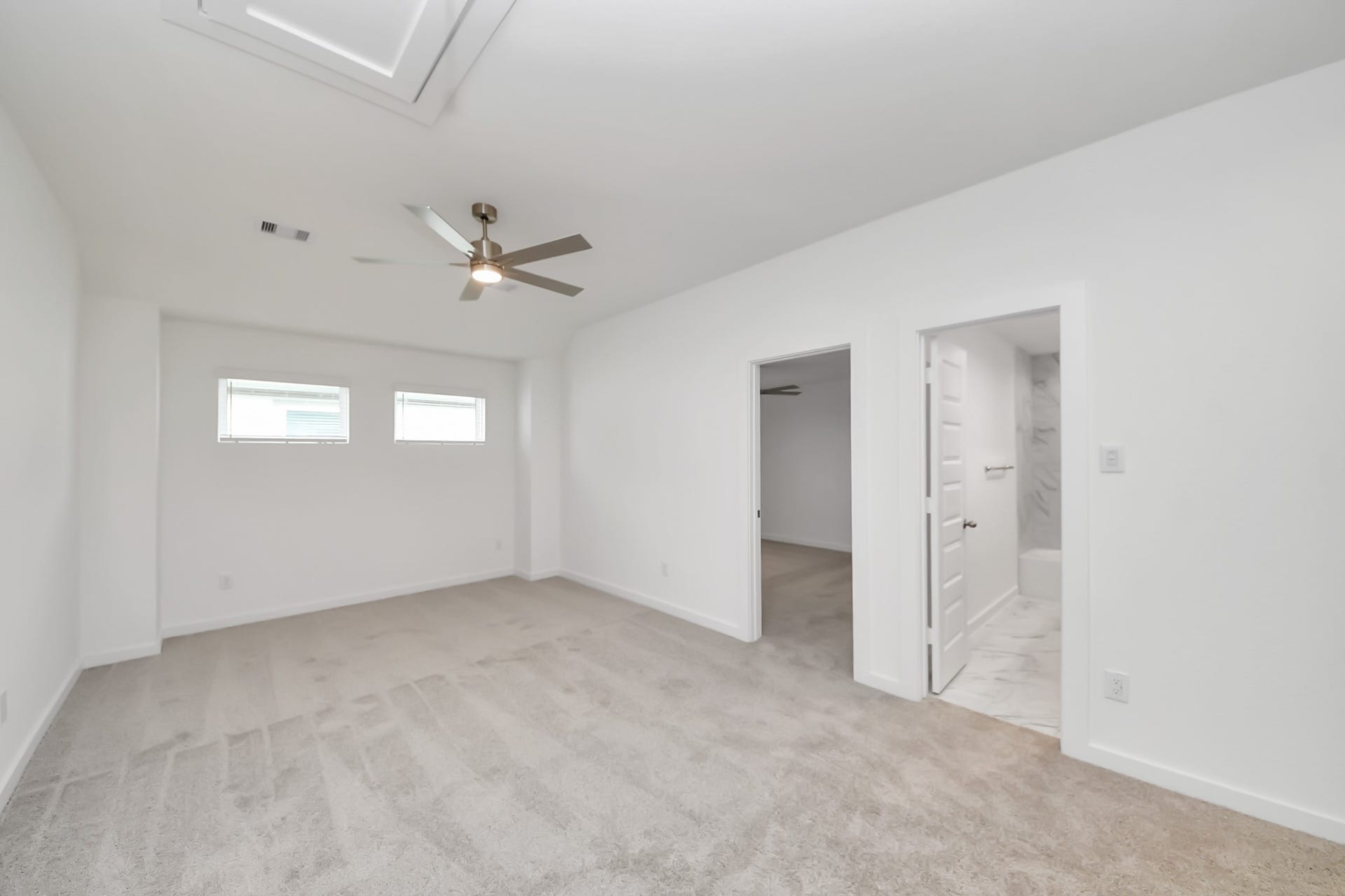 24515 Broad Park Ct, Spring, TX 77373 Come upstairs and enjoy a day of leisure in this fabulous game room! This is the perfect hangout spot or adult game room! Features plush carpet, high ceilings, custom paint and windows for plenty of natural light.