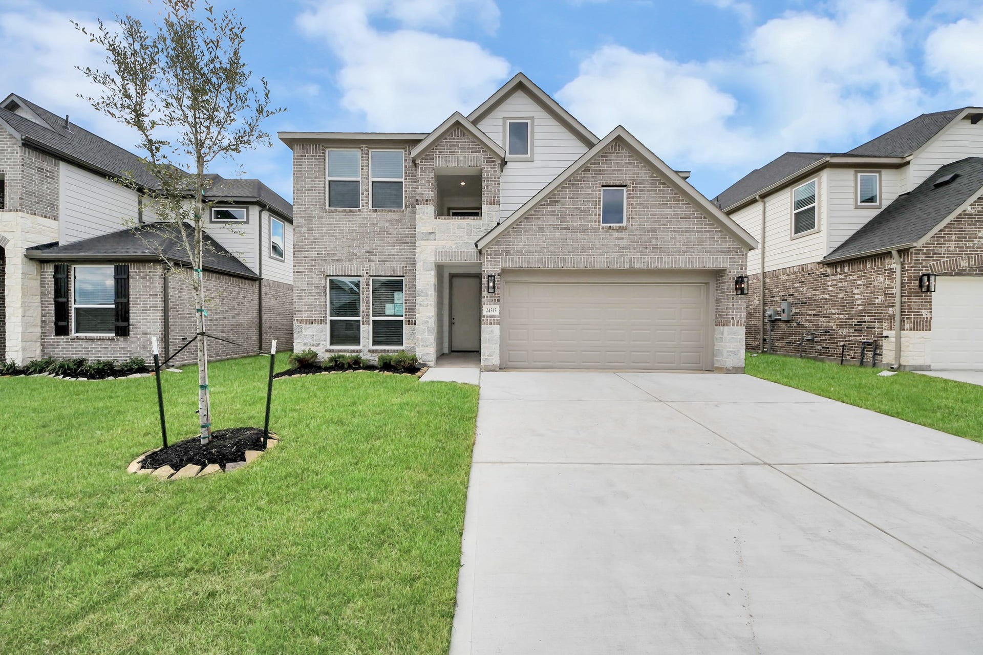 24515 Broad Park Ct, Spring, TX 77373 Home features a convenient 2-car garage complemented by a spacious driveway, offering ample parking for you and your guests.