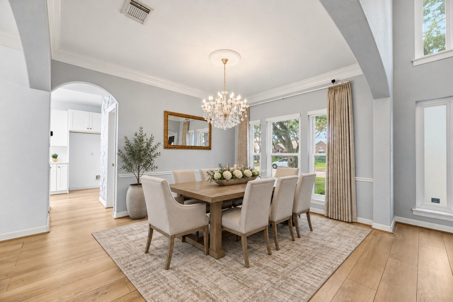 Virtually staged formal dining room.