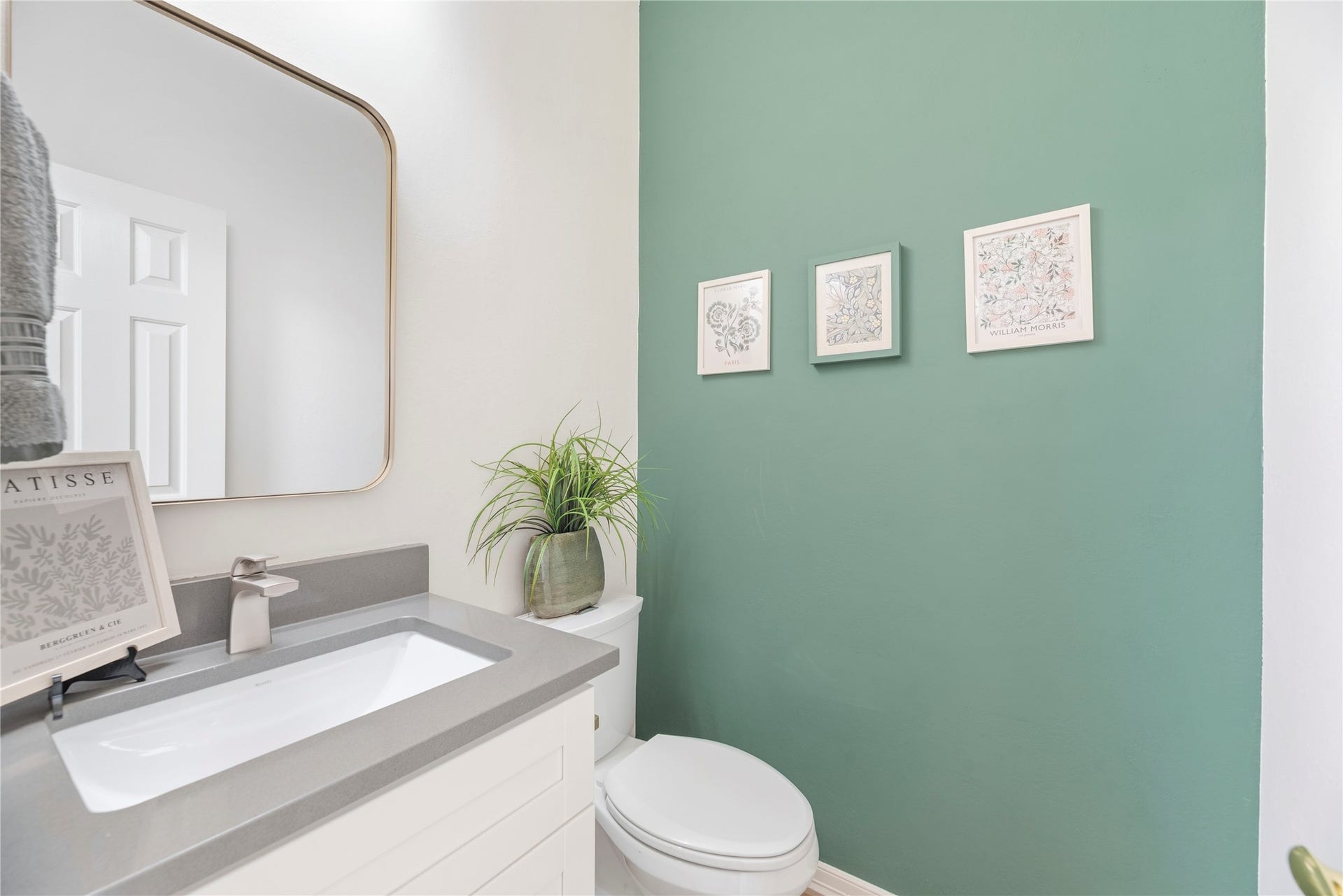 Convenient downstairs half bathroom.