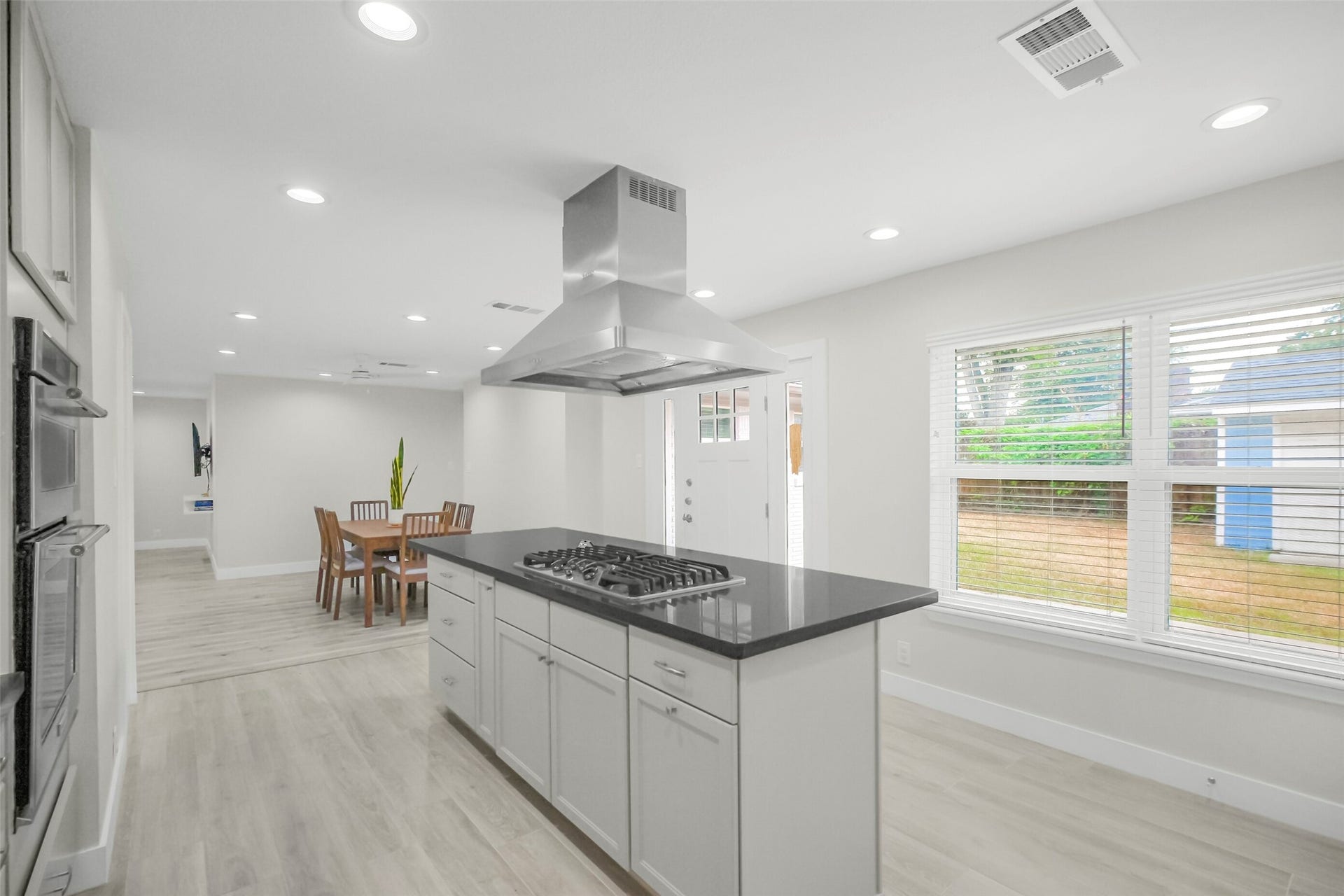 1710 Willowby Drive, Houston, TX 77008 Third view of the kitchen shows the backyard and ample cabinets/storage.