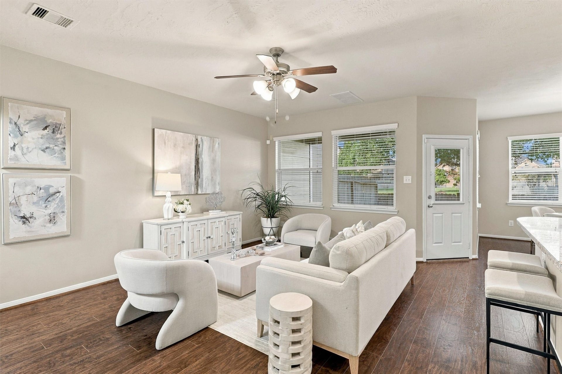 8323 Lamond Lane, Houston, TX 77095 Meticulously maintained, this 2-story townhome features refreshed interior paint (2026), NEW carpet in the bedrooms (2026), cohesive wood-look flooring throughout the 1st floor, elegant lighting, crisp white kitchen cabinets, and updated half-bath tile.