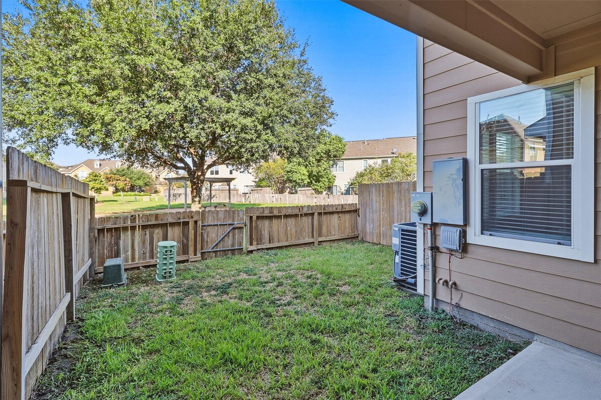 8323 Lamond Lane, Houston, TX 77095 The private yard features an updated fence and sprinkler system maintained by the HOA. No need to worrry about exterior paint either!