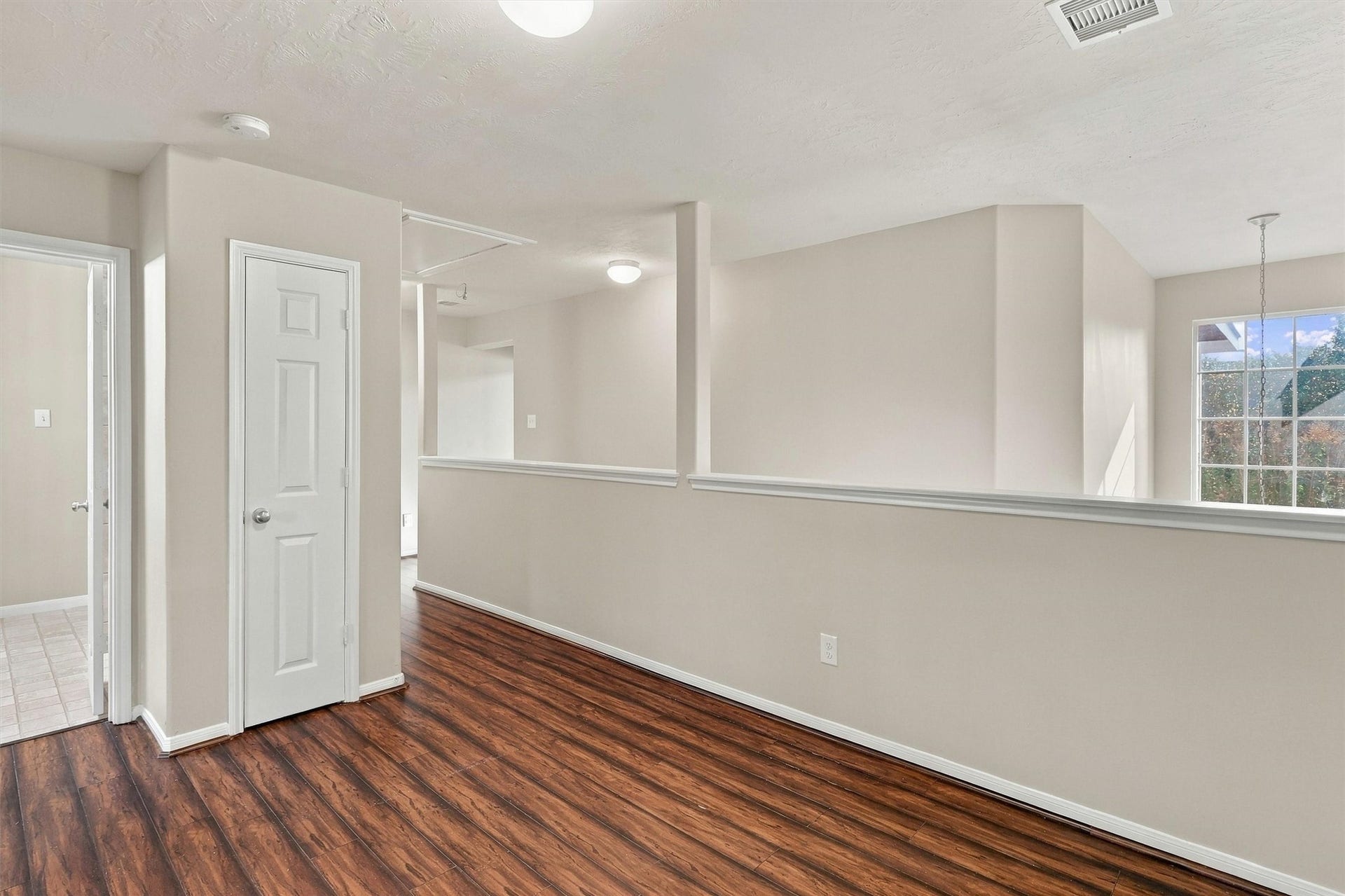 8323 Lamond Lane, Houston, TX 77095 Travel outside the primary suite to find your game room at the top of the stairs! This space is perfect for play or setting up a home office. A convenient storage closet is located at the back of the room.