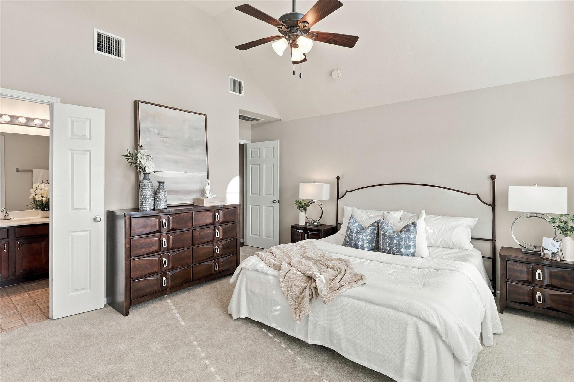 8323 Lamond Lane, Houston, TX 77095 This view of the primary suite shows how spacious it is. Double doors open to your en suite primary bathroom.