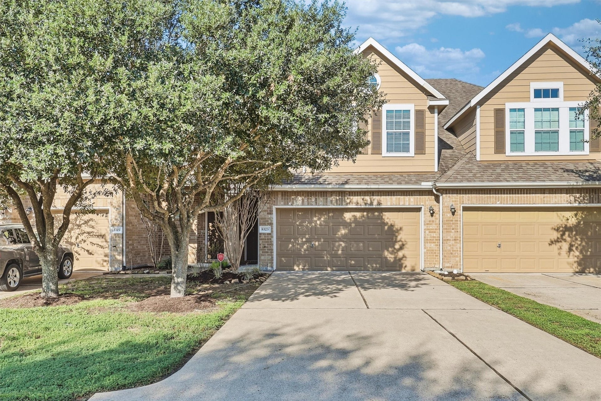 8323 Lamond Lane, Houston, TX 77095 The 2-car garage and double wide driveway offer plenty of space for parking. The double-wide driveway offers more space between you and your neighbors as well!