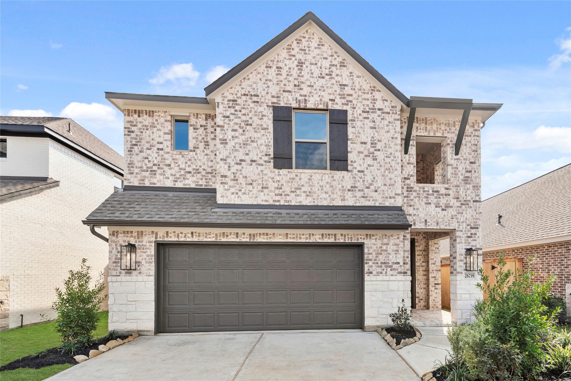 Move in Ready. Westin Homes *New Construction* Terrace Plan. Grass is digitally enhanced.