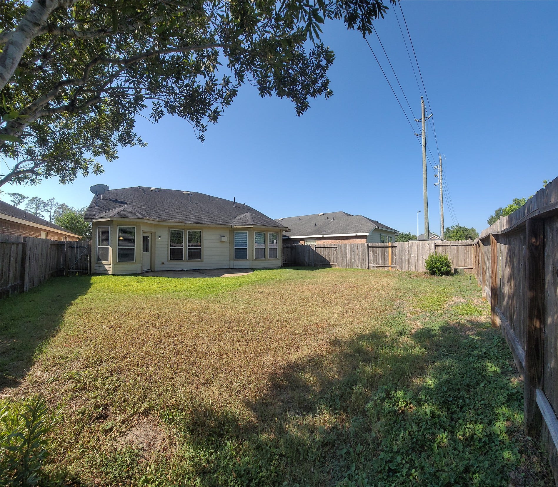 12638 Ember Village Lane, Tomball, TX 77377 Backyard. Lawn maintenance included.
