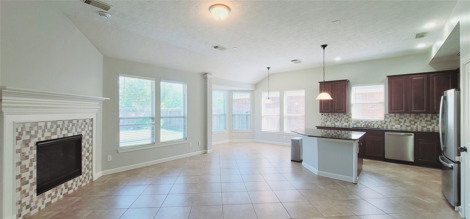 12638 Ember Village Lane, Tomball, TX 77377 Open family room to the kitchen and breakfast