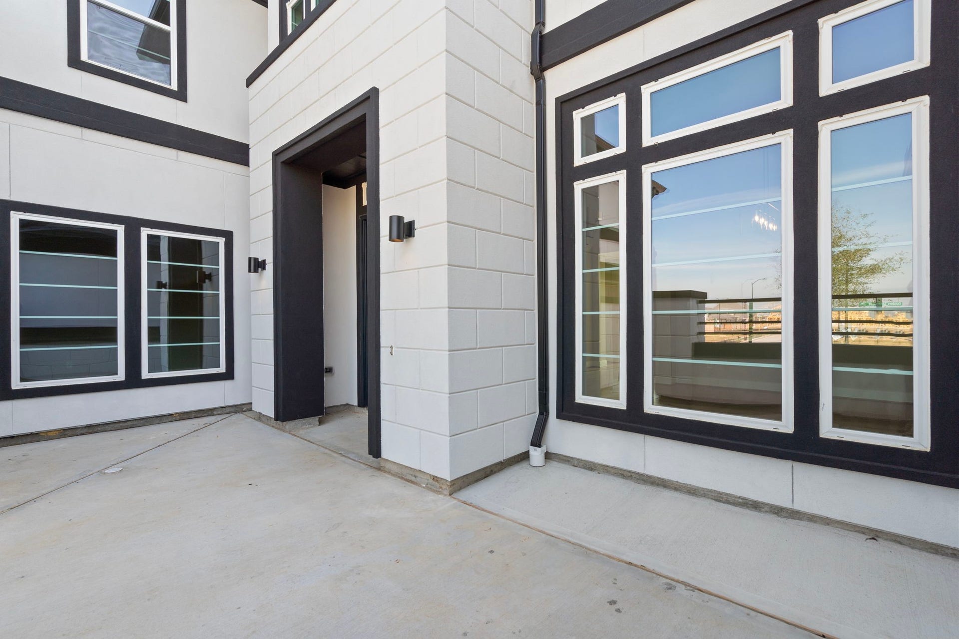 24706 Tall Grapevine Ct Drive, Katy, TX 77493 Representative example of how the home will look. Spectacular entry courtyard welcomes guests.