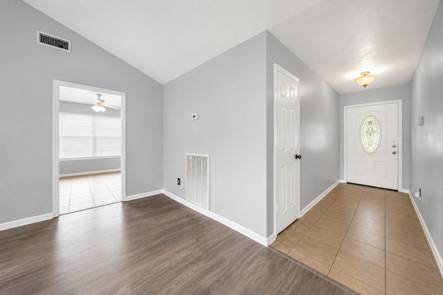 1707 Stone Lake Drive, Missouri City, TX 77489 Step inside to a welcoming entryway featuring updated flooring and a bright, neutral color palette.