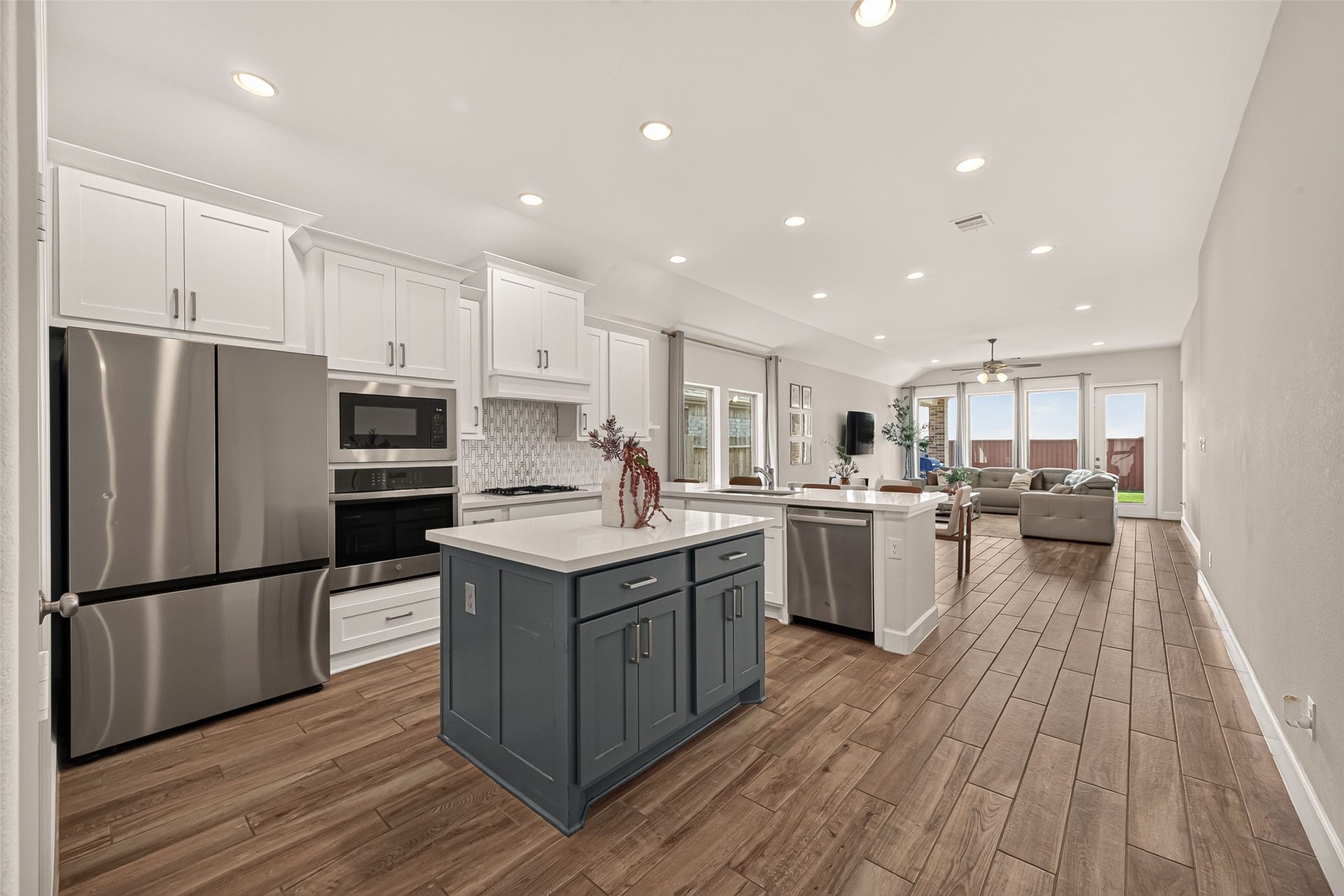 24111 Avocet Creek Road, Katy, TX 77493 When having an open concept like this, the natural light coming from the windows fills out the environment.