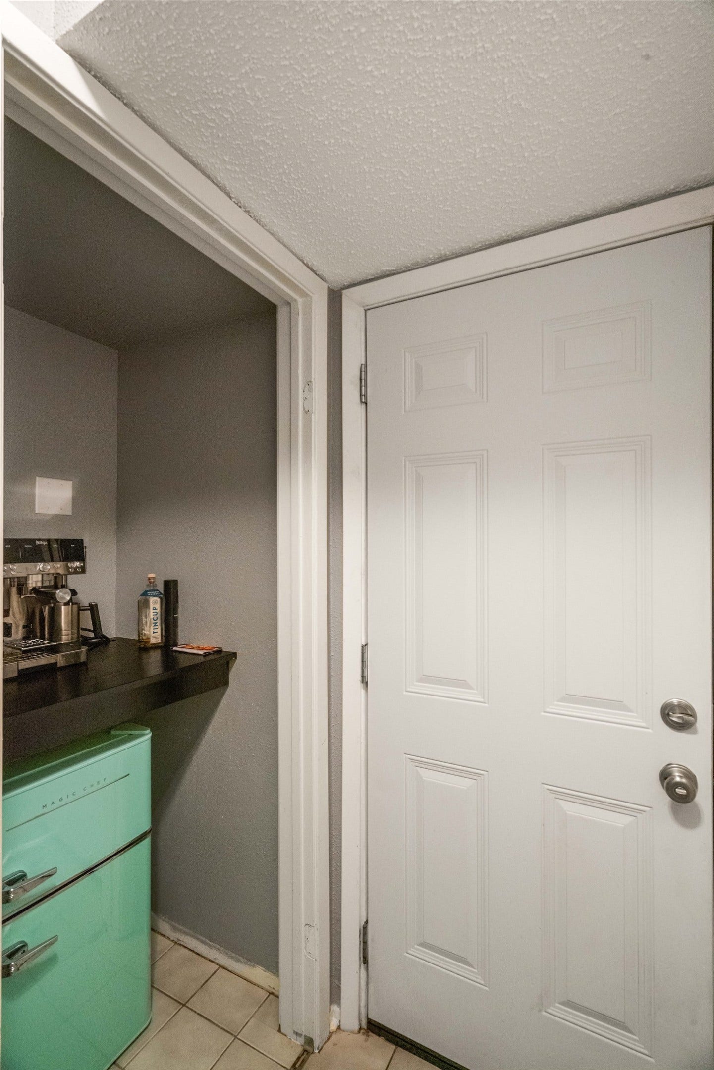 3200 S Gessner Road, #336, Houston, TX 77063 Just off the kitchen is a repurposed closet made into a cute coffee bar.