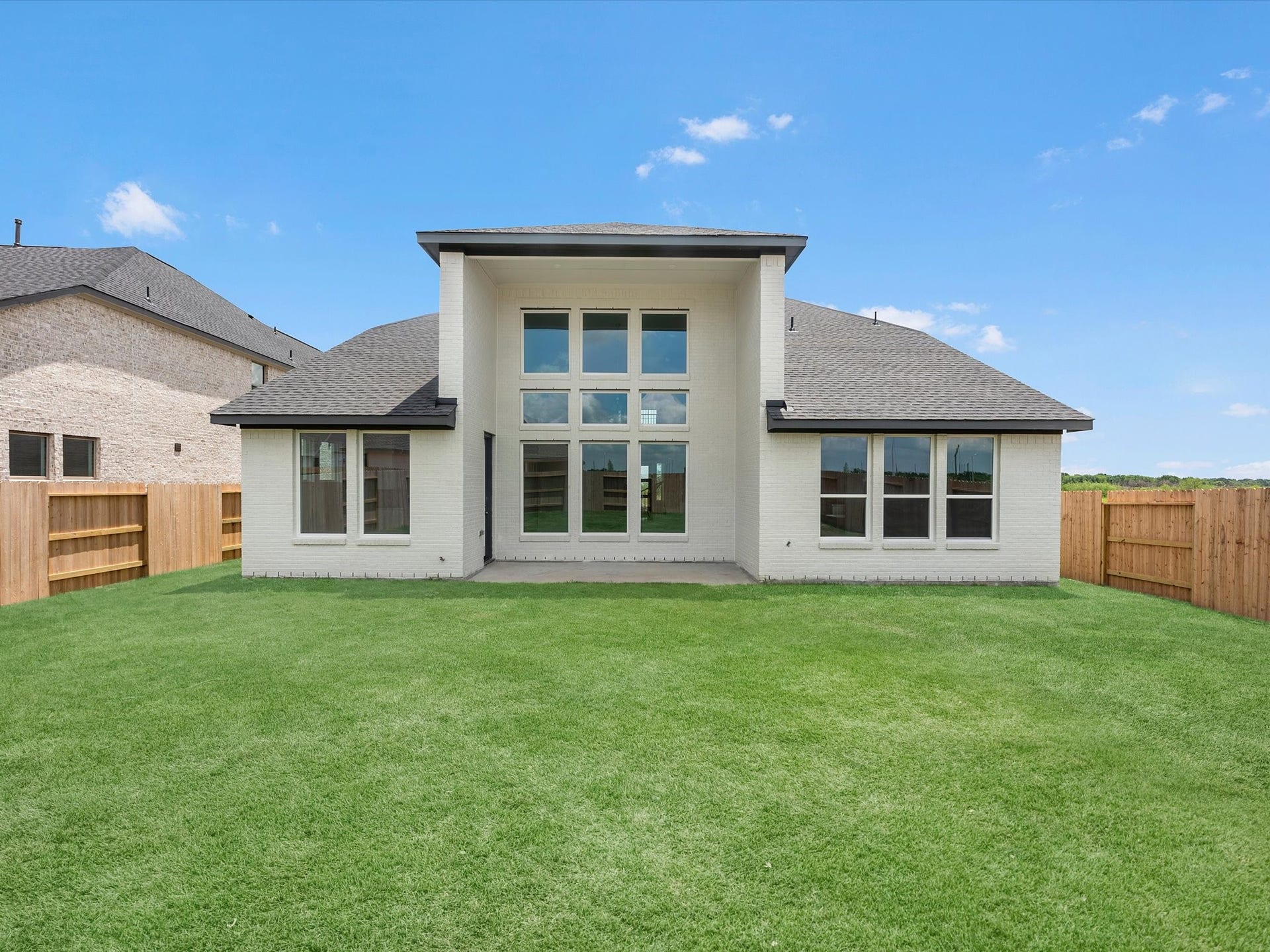 5227 Silk Petal Drive, Rosenberg, TX 77471 Grass is digitally enhanced.
