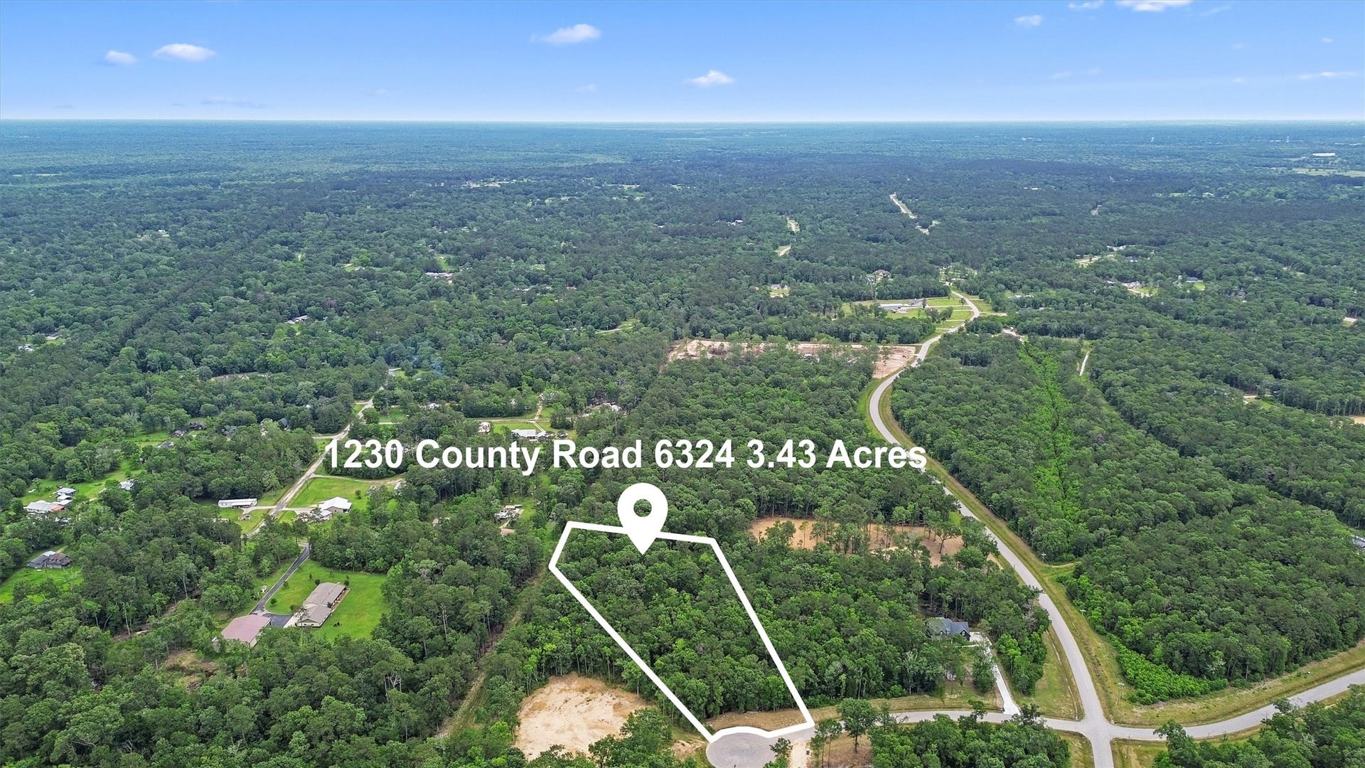 1230 Road 6324, Dayton, TX 77535 Aerial property outline highlights the size and configuration of this 3.43-acre wooded residential homesite in White Oak Trails. Boundary depiction is approximate; buyer should verify by survey.