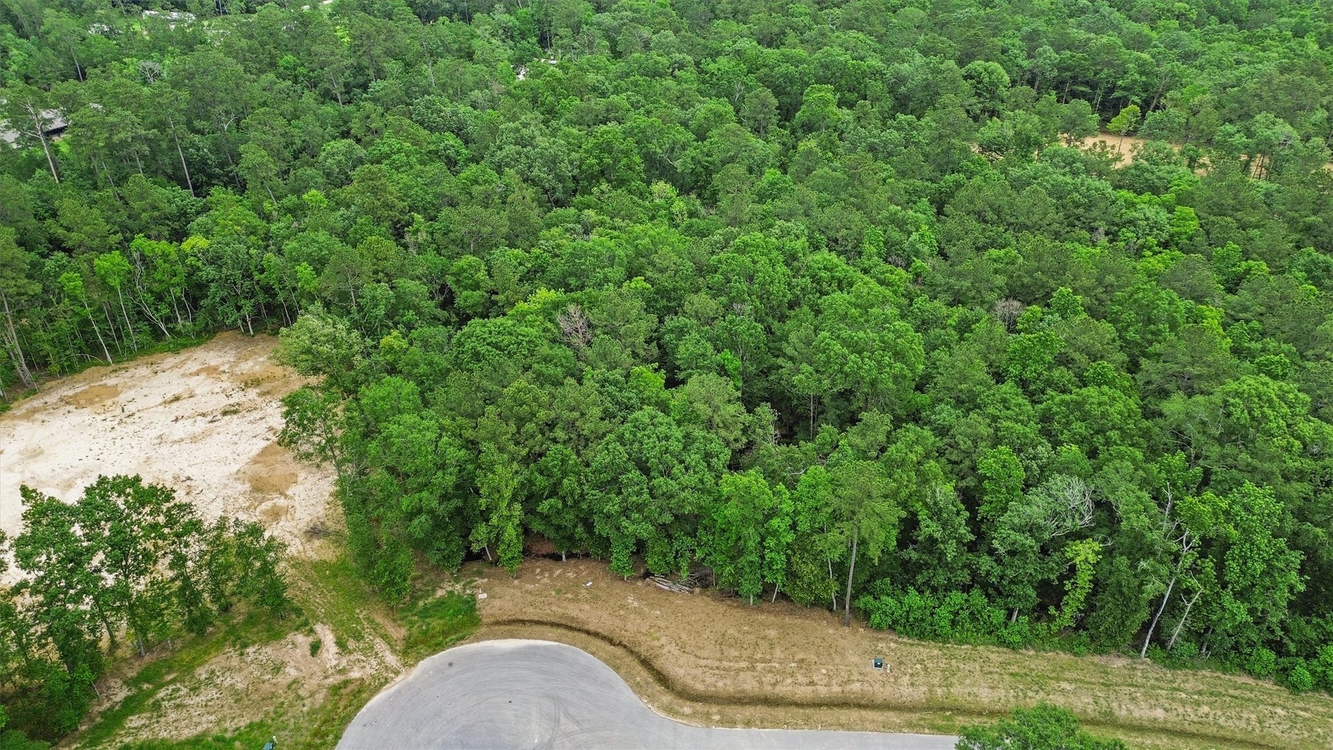1230 Road 6324, Dayton, TX 77535 Tucked at the end of a cul-de-sac, this wooded acreage homesite offers the privacy and space buyers seek when building outside a traditional suburban setting.