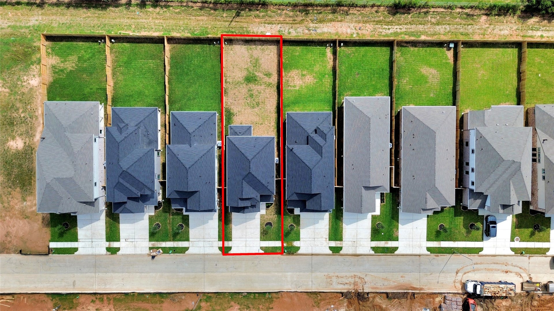 15947 Sycamore Maple Lane, Cypress, TX 77429 An aerial view of a spacious subdivision lot, highlighting a well-maintained yard and a fully fenced perimeter, offering both privacy and expansive outdoor space.