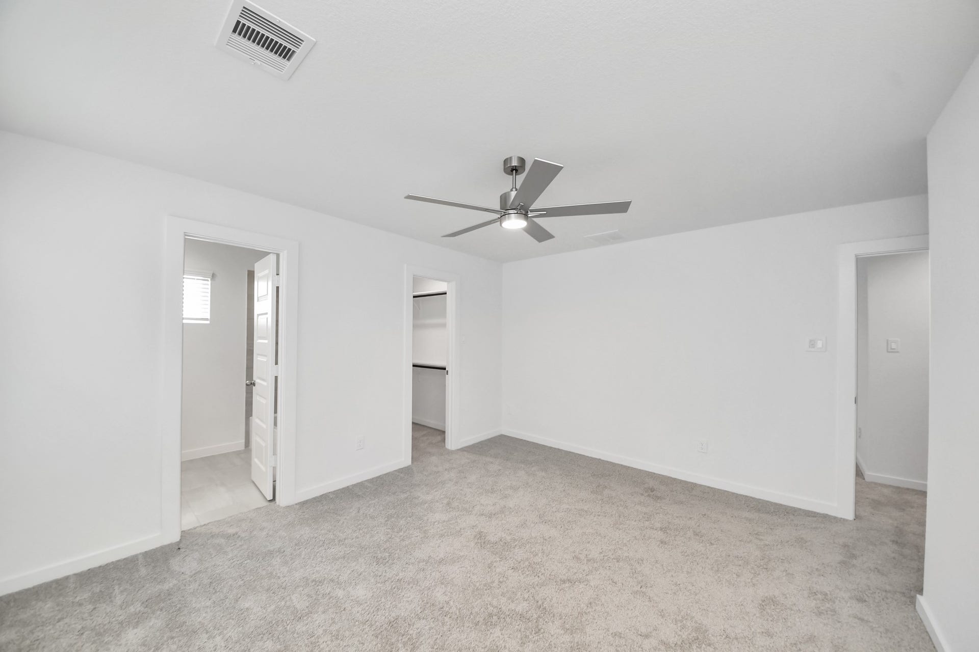 15947 Sycamore Maple Lane, Cypress, TX 77429 Generously sized secondary bedrooms featuring spacious closets, soft and inviting carpeting underfoot, large windows allowing plenty of natural light, and the added touch of privacy blinds for your personal retreat.