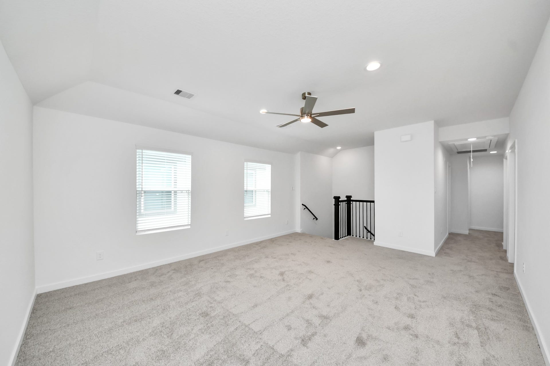 15947 Sycamore Maple Lane, Cypress, TX 77429 Come upstairs and enjoy a day of leisure in this fabulous game room! This is the perfect hangout spot or adult game room! Features plush carpet, high ceilings, custom paint and windows for plenty of natural light.