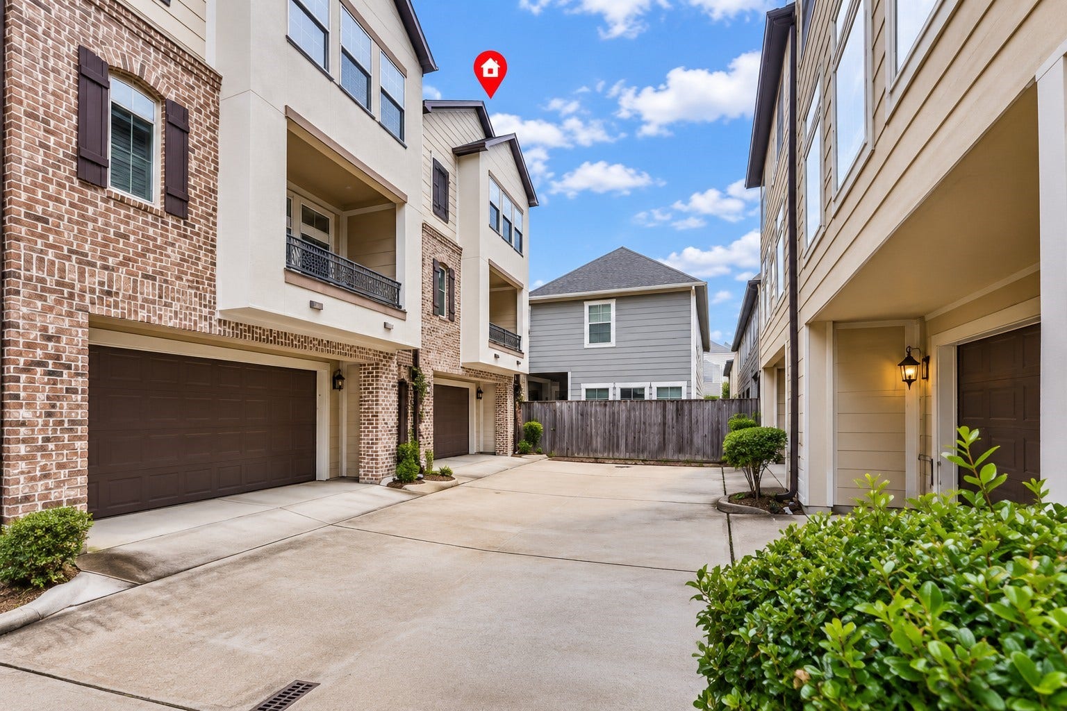2602 Ashland Street, Houston, TX 77008 This three-story home features charming brick accents and a covered balcony.
