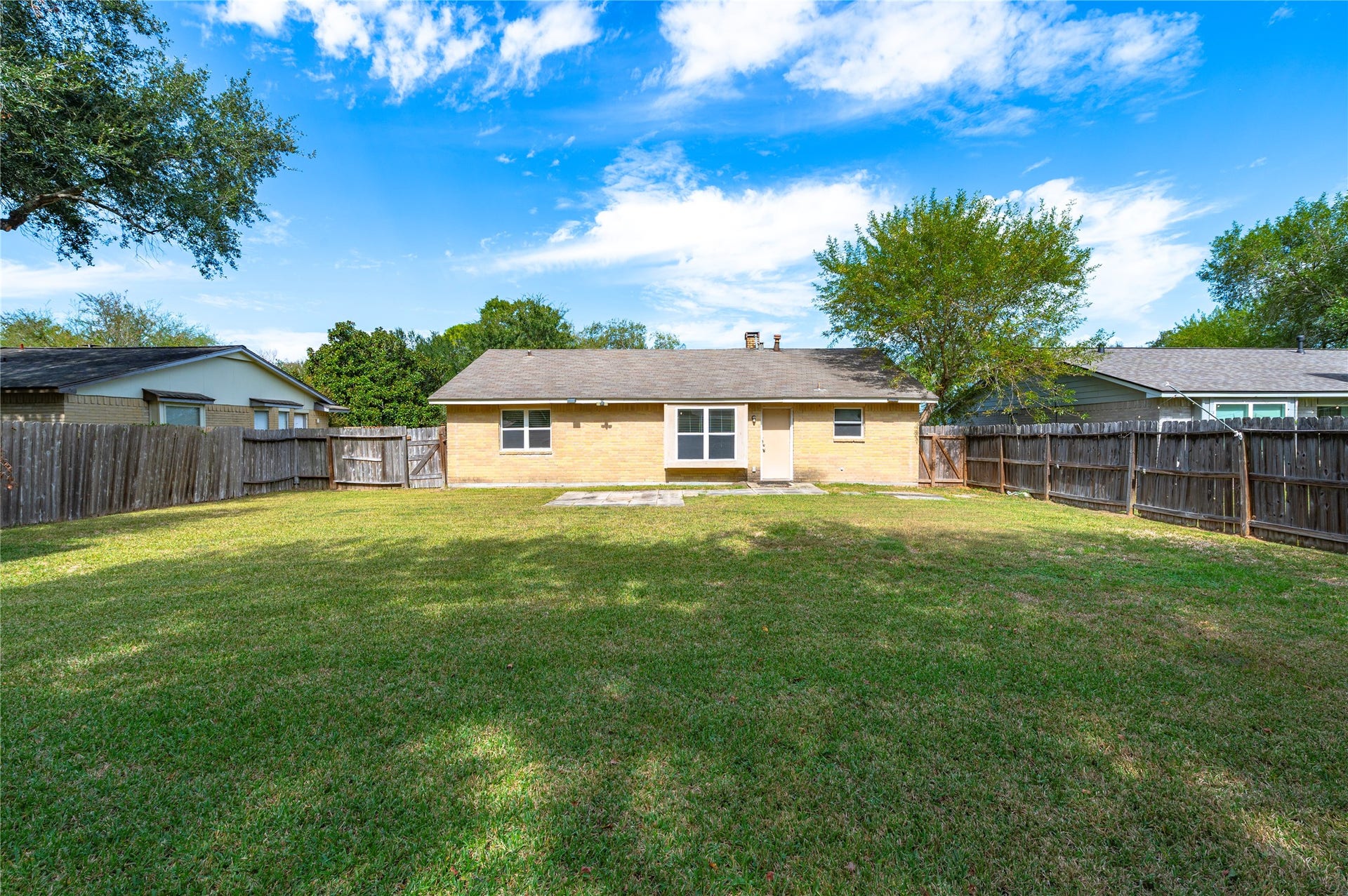 2515 Knoxville Drive, League City, TX 77573 Trees along the back fence give the backyard a great shaded space.
