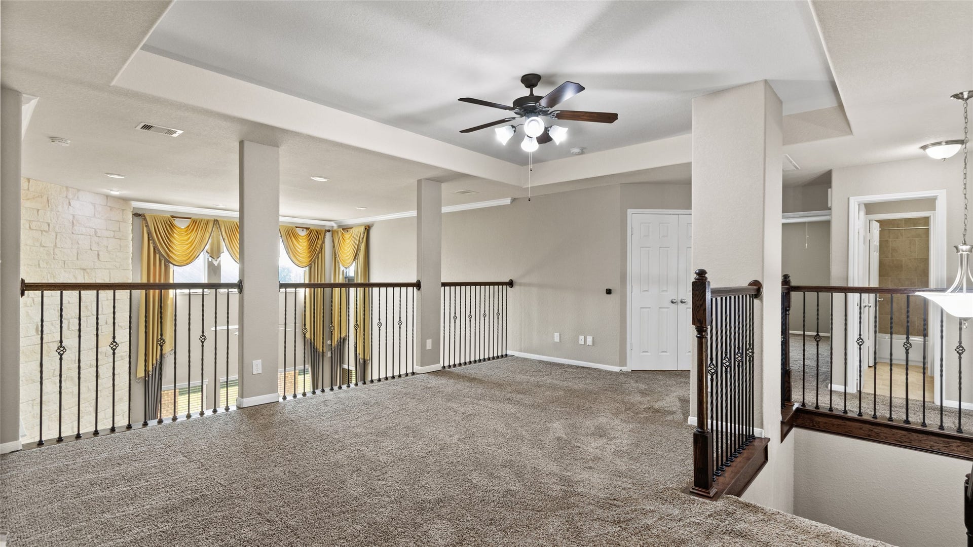 12106 Obsidian Lane, Mont Belvieu, TX 77535 This versatile space is ideal as a secondary living area for those residing on the second level, or it could easily serve as a dedicated gameroom for the whole family.