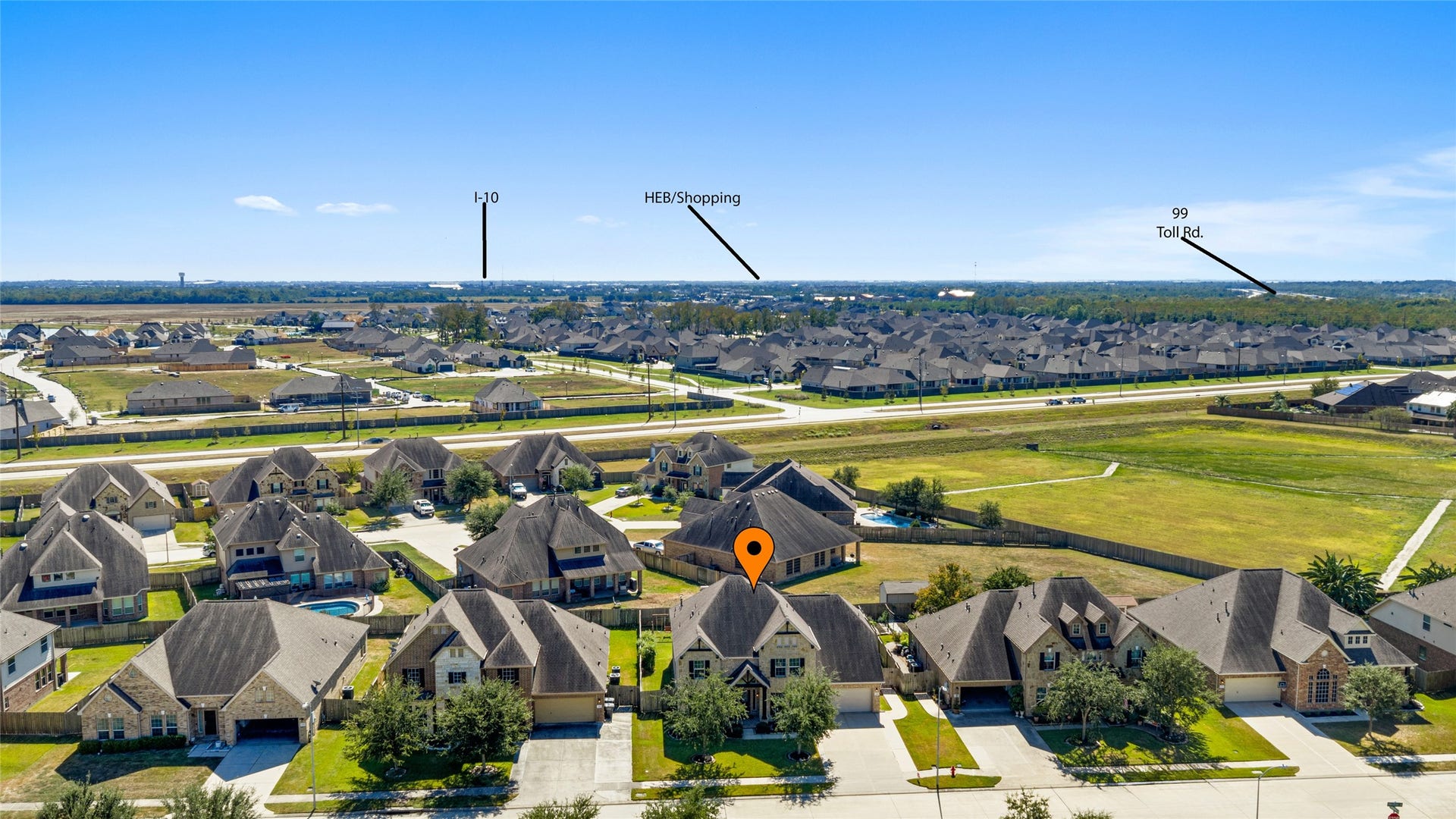 12106 Obsidian Lane, Mont Belvieu, TX 77535 Aerial view highlighting proximity to Grand Parkway (Hwy 99), I-10, and nearby shopping centers, including H-E-B.