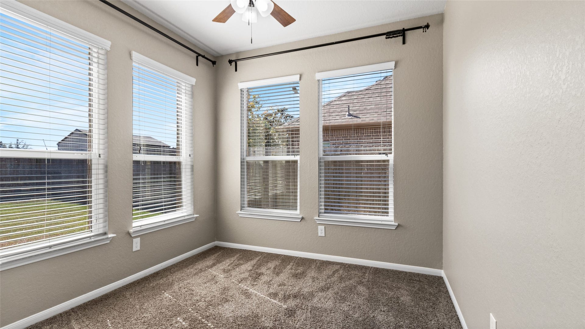 12106 Obsidian Lane, Mont Belvieu, TX 77535 This sunroom offers a versatile, light-filled space that can easily be reimagined to suit your lifestylewhether you choose to use it as a cozy reading nook, a productive home office, or a creative studio, the possibilities are endless.