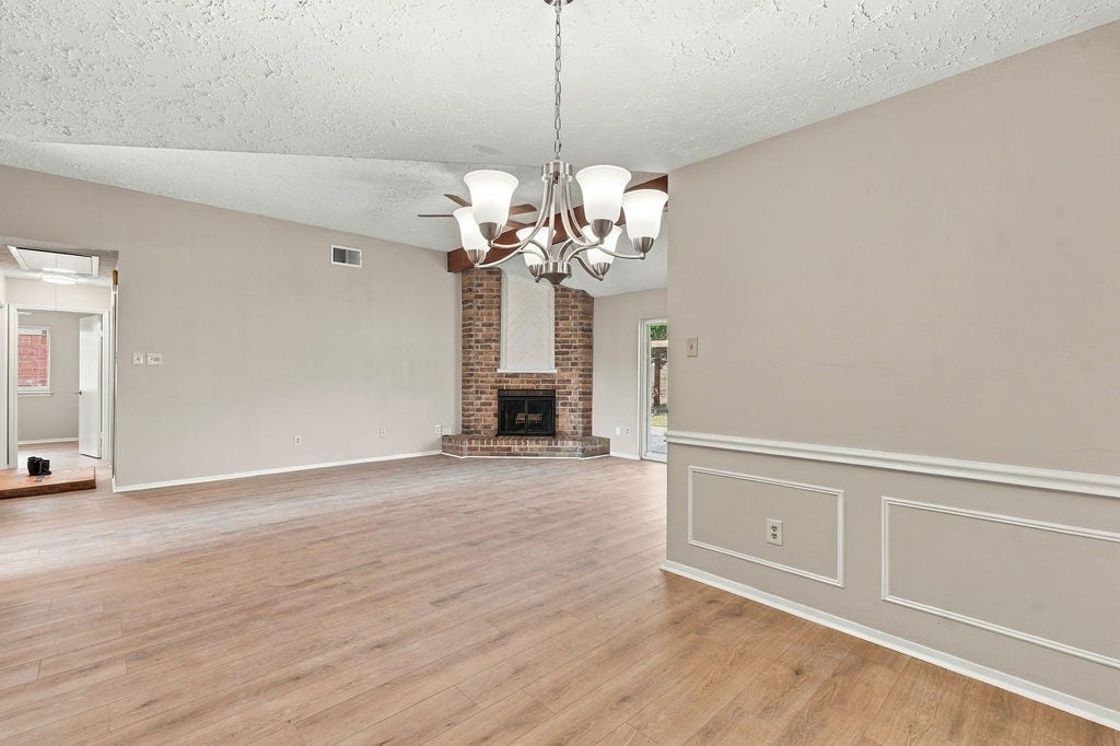 407 Ironbark Drive, Houston, TX 77598 Dining room looking into living room