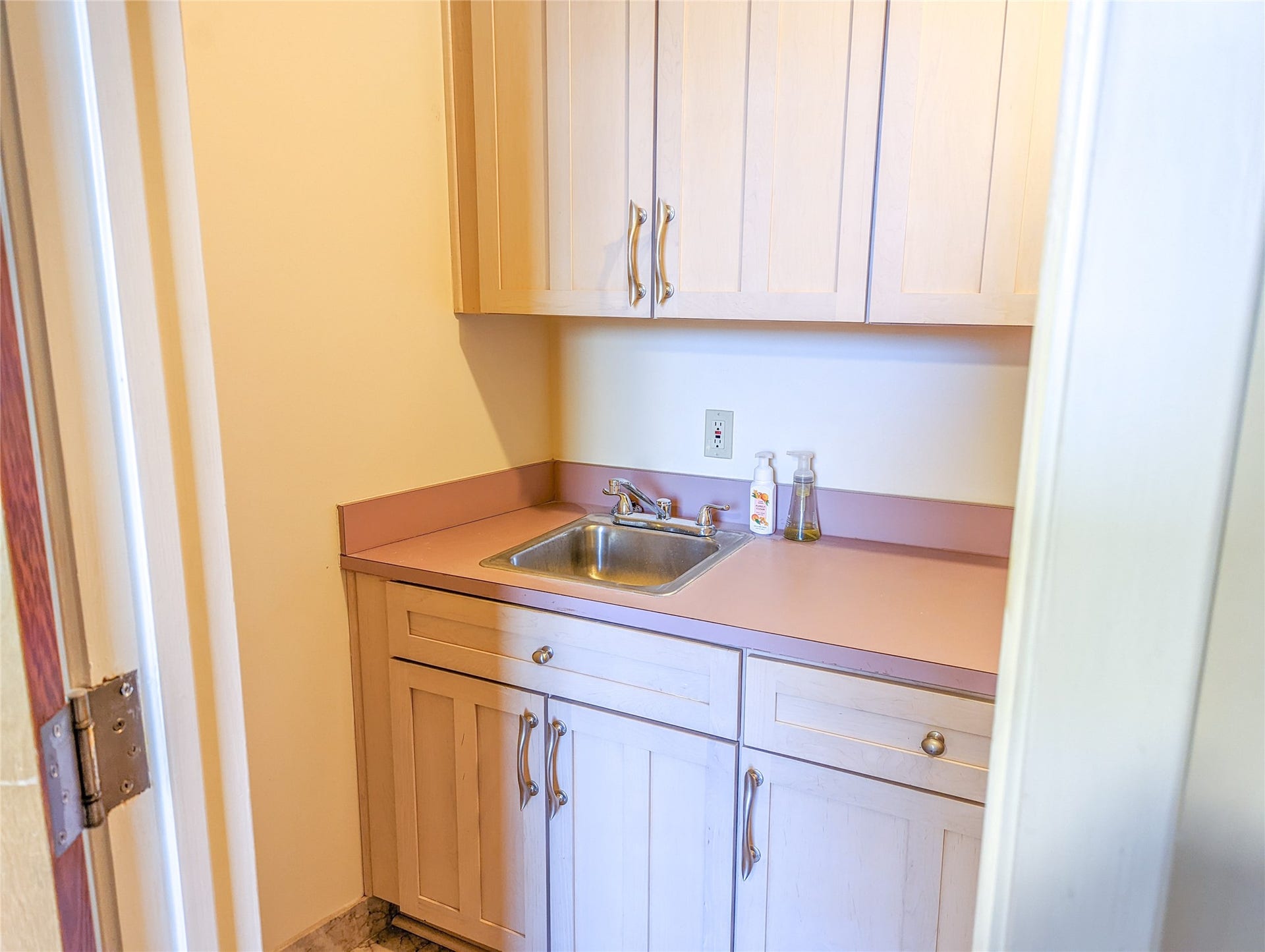 711 Main St Street, #905, Houston, TX 77002 Connected to flex space is an additional sink, storage, countertop space, etc.