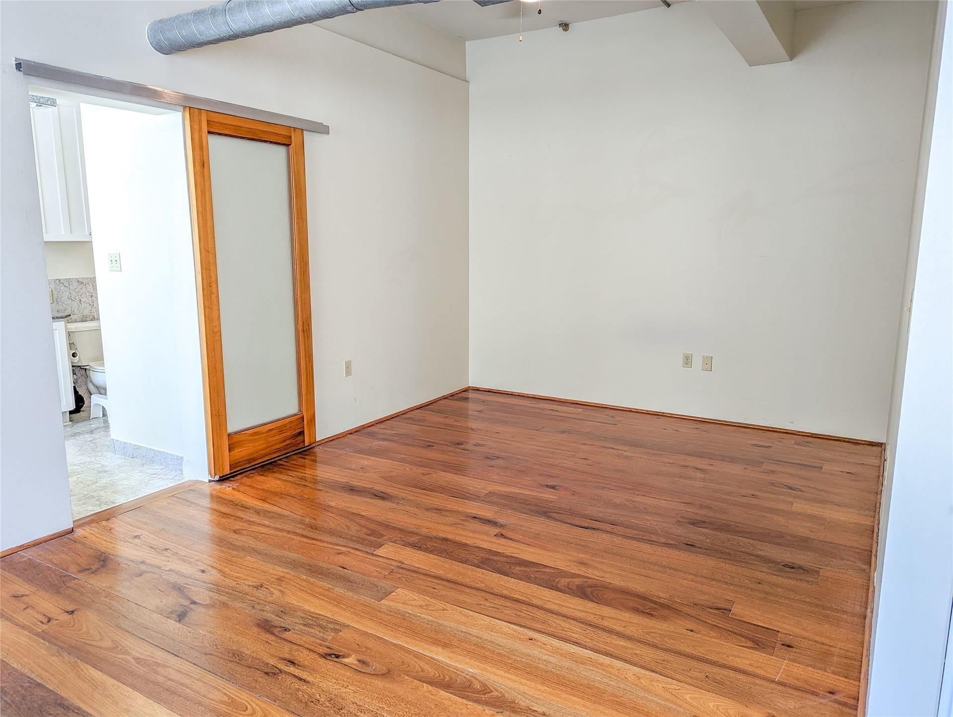 711 Main St Street, #905, Houston, TX 77002 Semi-open plan continues to bedroom for a less closed-off feeling