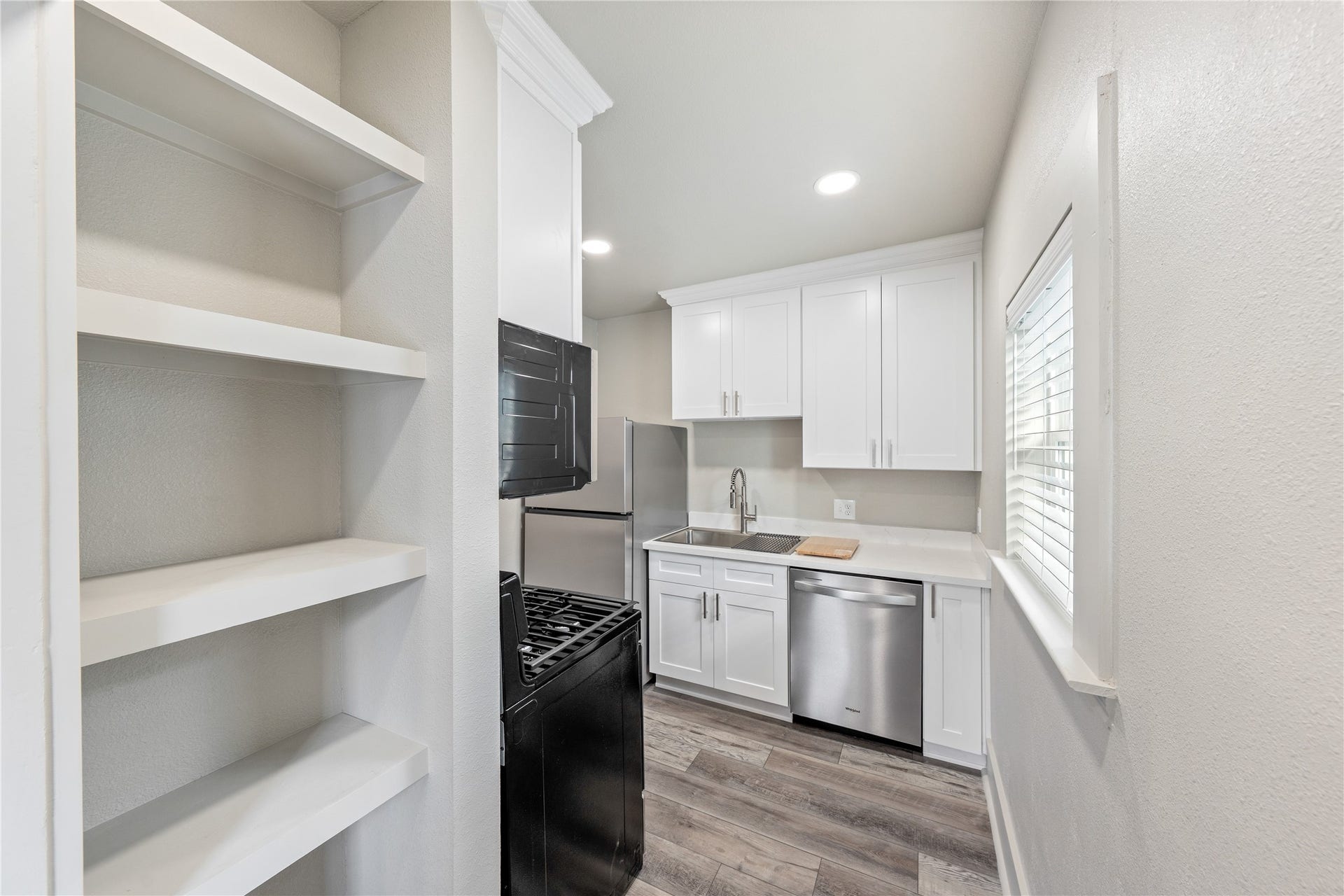 211 N Milby Street, #4, Houston, TX 77003 Pantry at Kitchen Entry