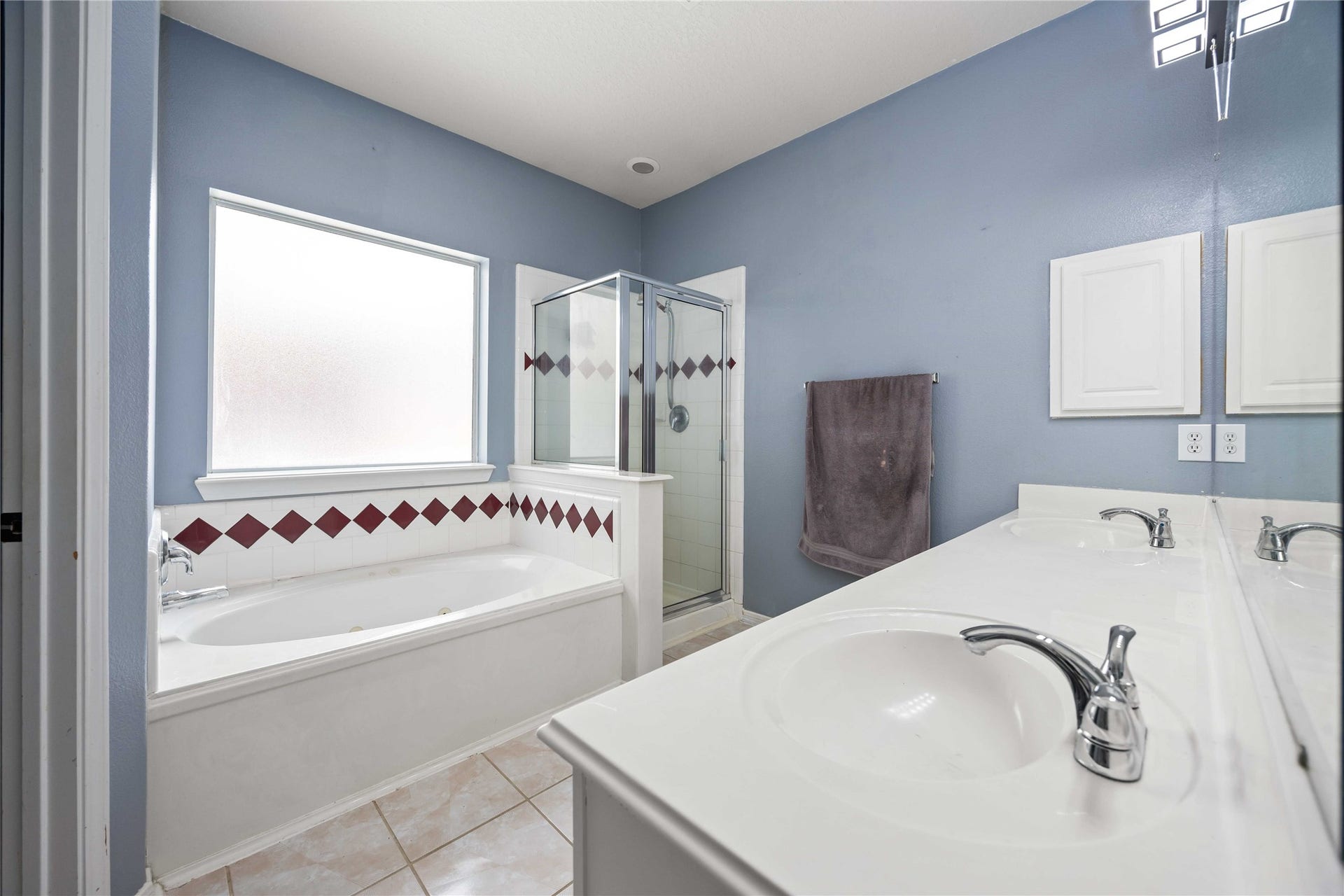 Separate tub and shower.