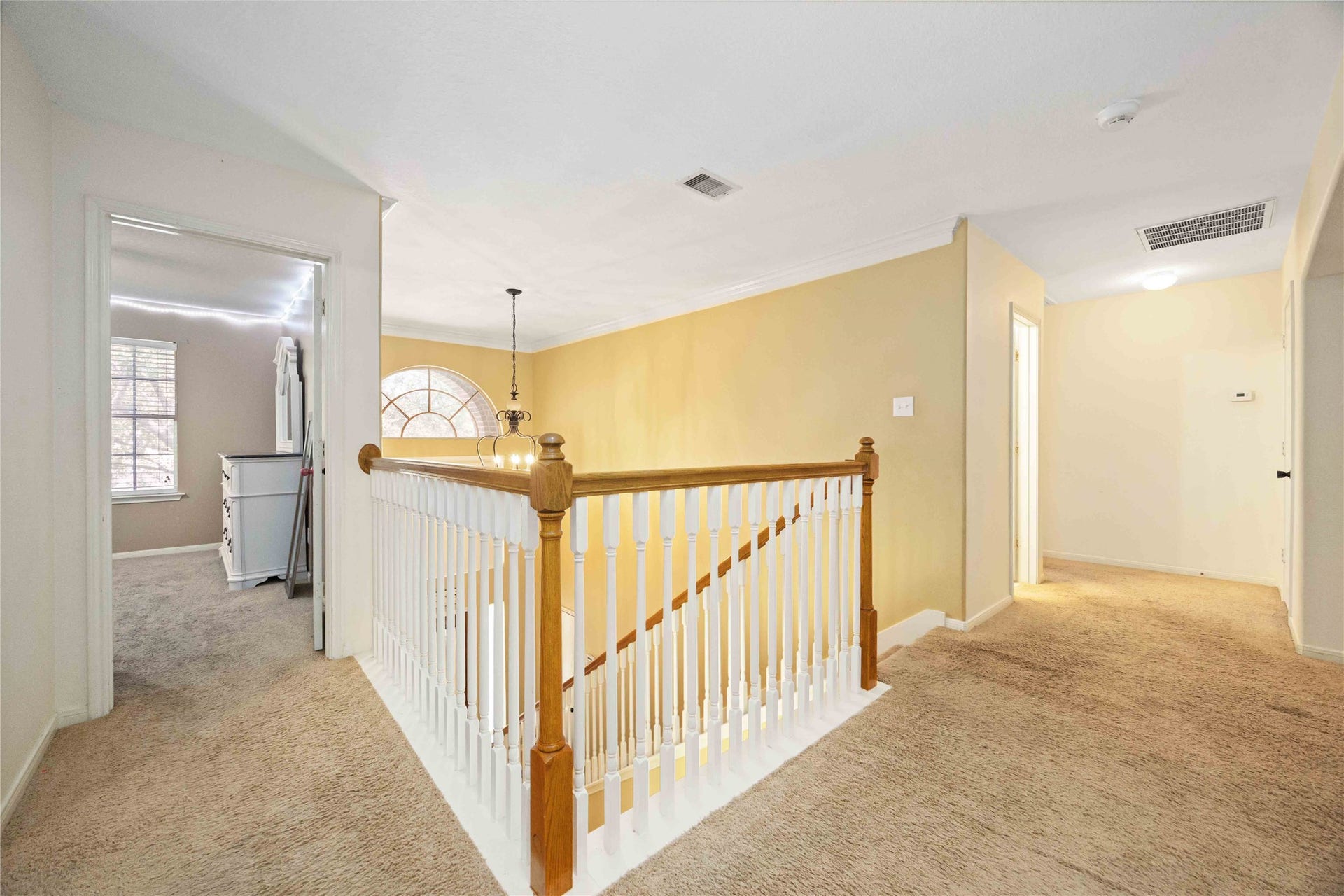 Overlooking the banister.