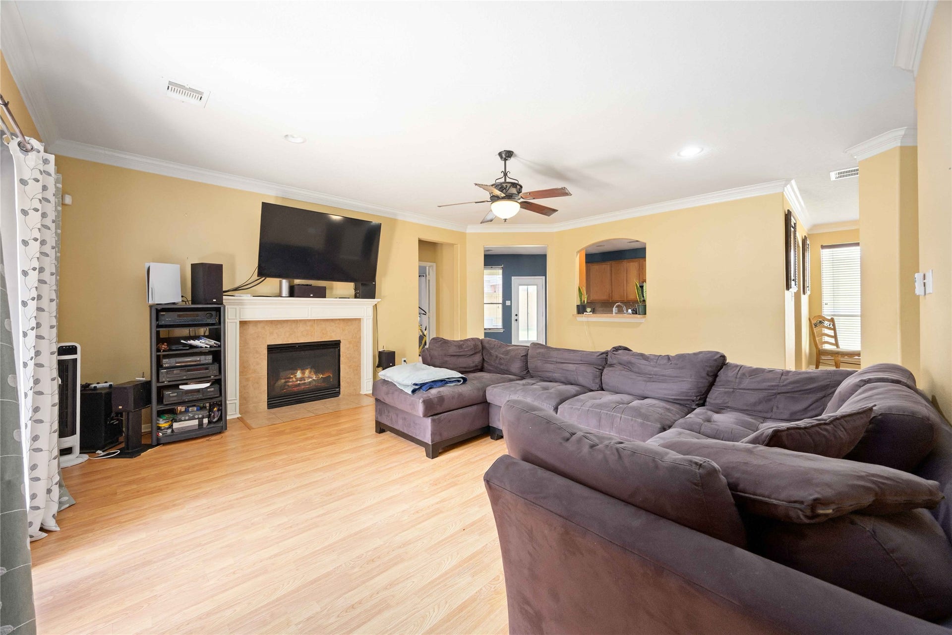 A view towards the Kitchen and Formal Dining room.