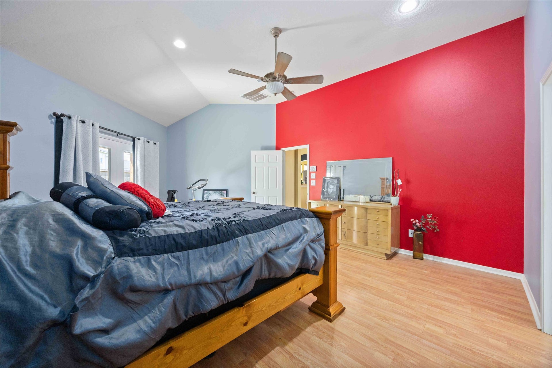 Primary bedroom has French doors exiting to the extended 2nd patio