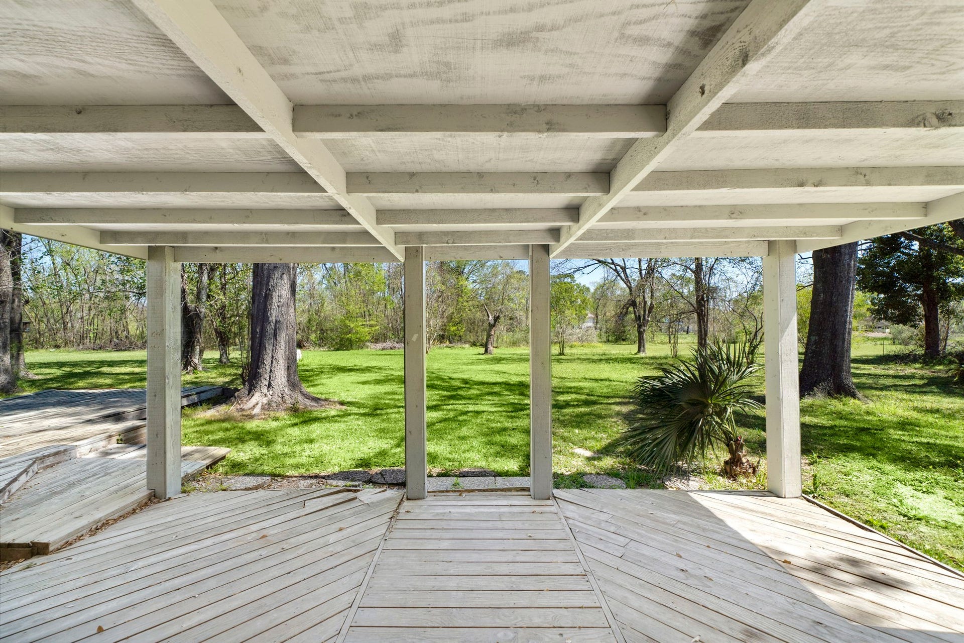 7710 Antoine Drive, Houston, TX 77088 Back patio -new pillars and repairs to the deck have been recently made