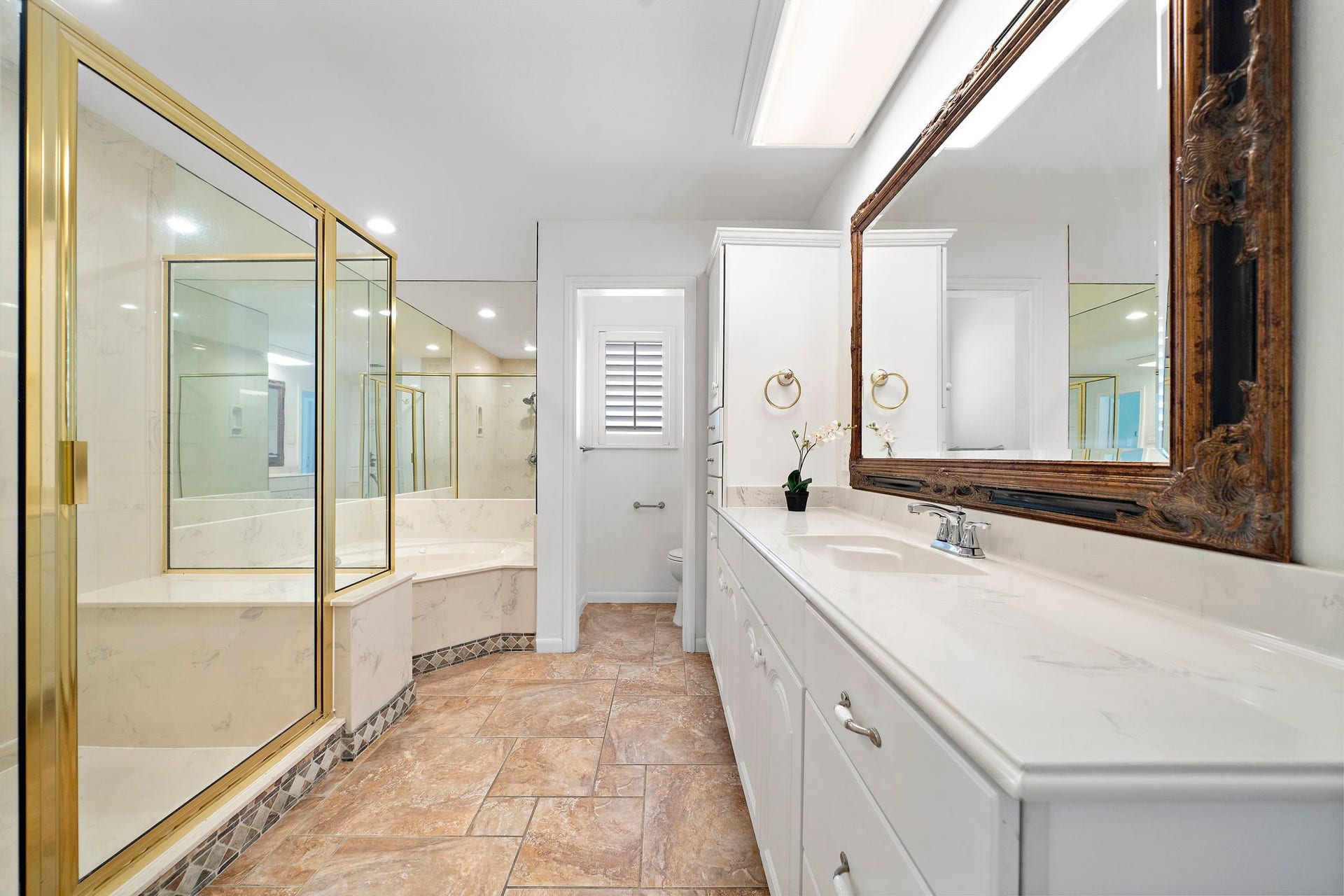 7710 Antoine Drive, Houston, TX 77088 En suite bathroom with a shower and jacuzzi
