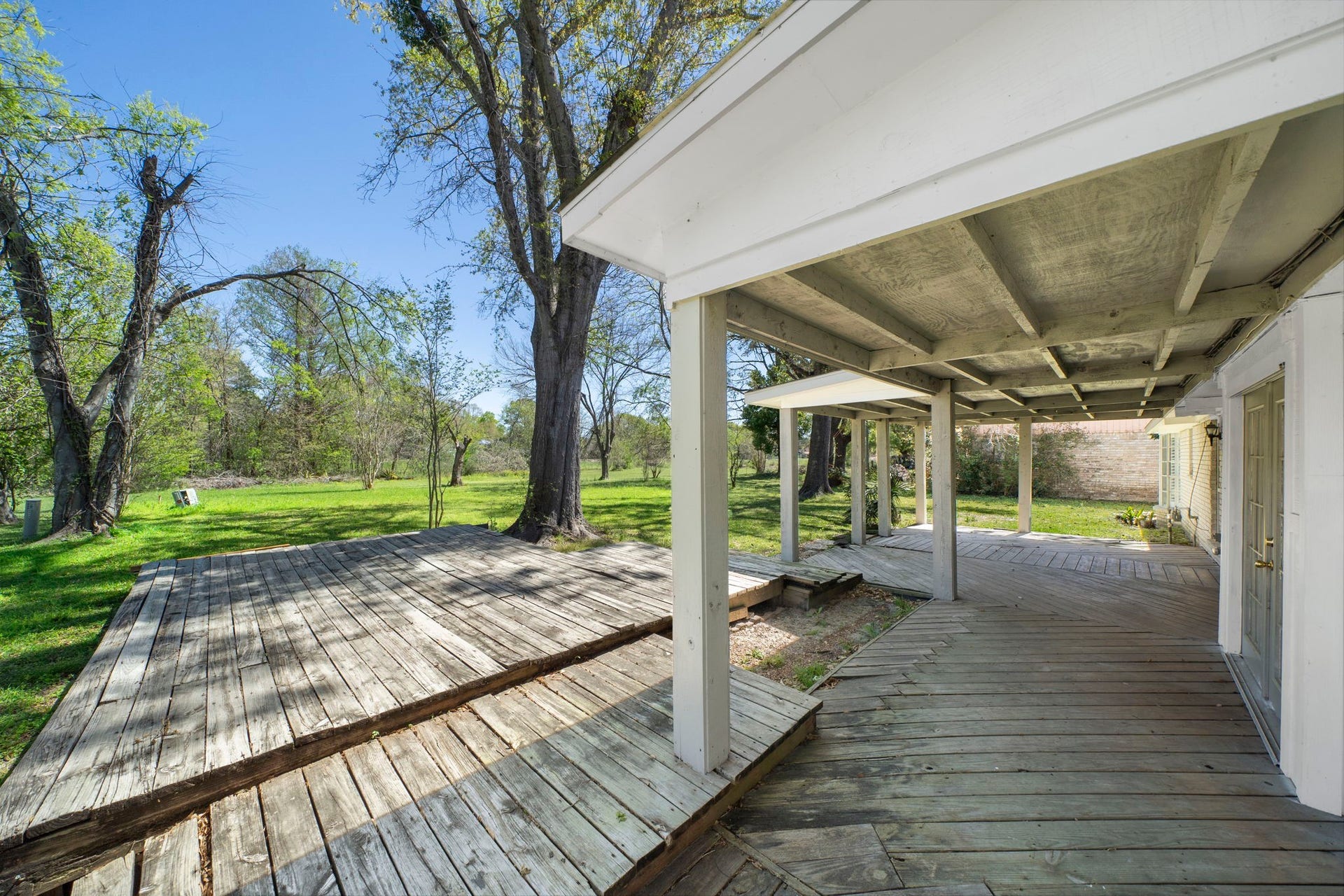7710 Antoine Drive, Houston, TX 77088 Back patio with deck
Soon backyard will have a lake view!