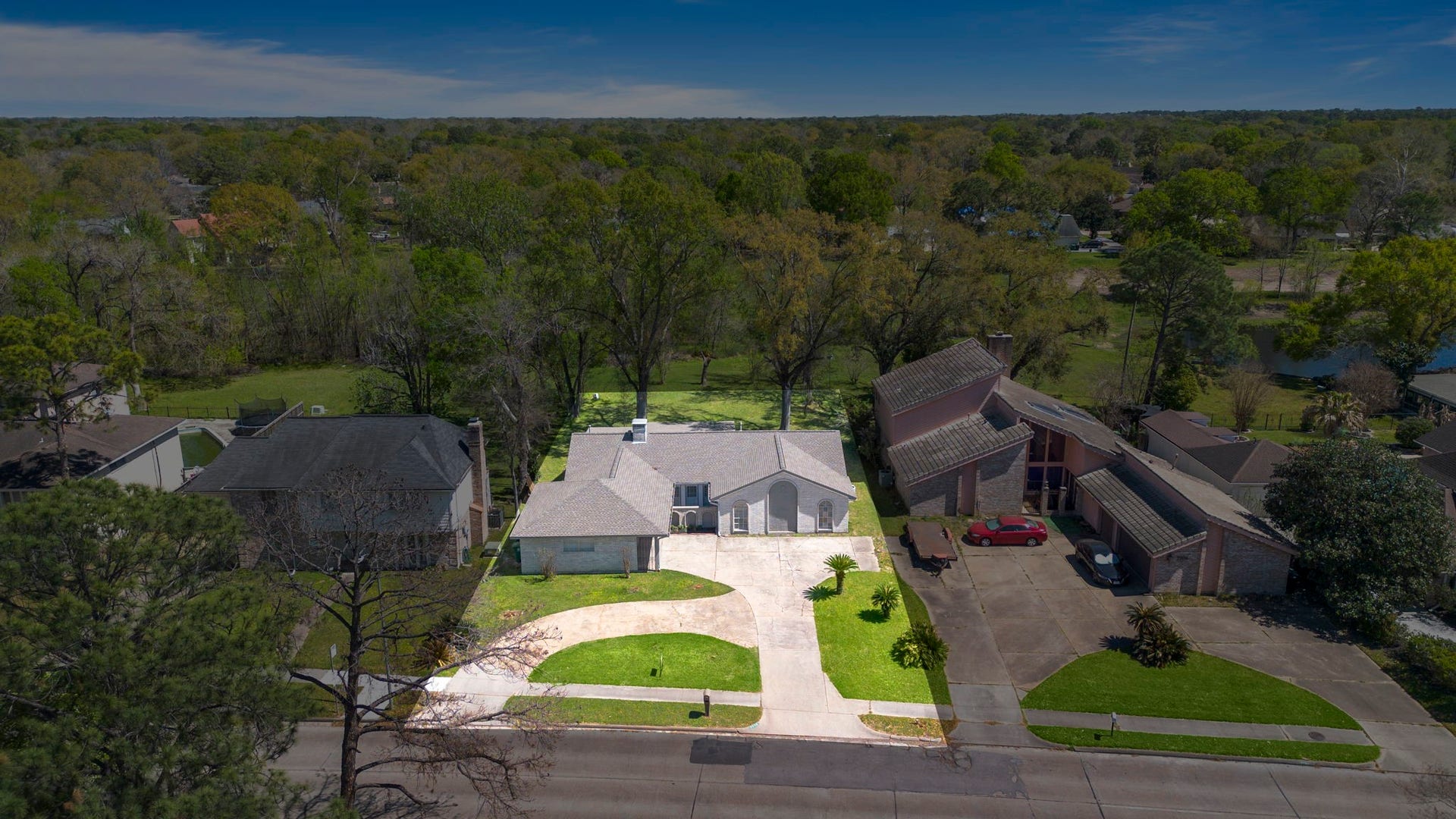 7710 Antoine Drive, Houston, TX 77088 Aerial view of home has a large front and back yard