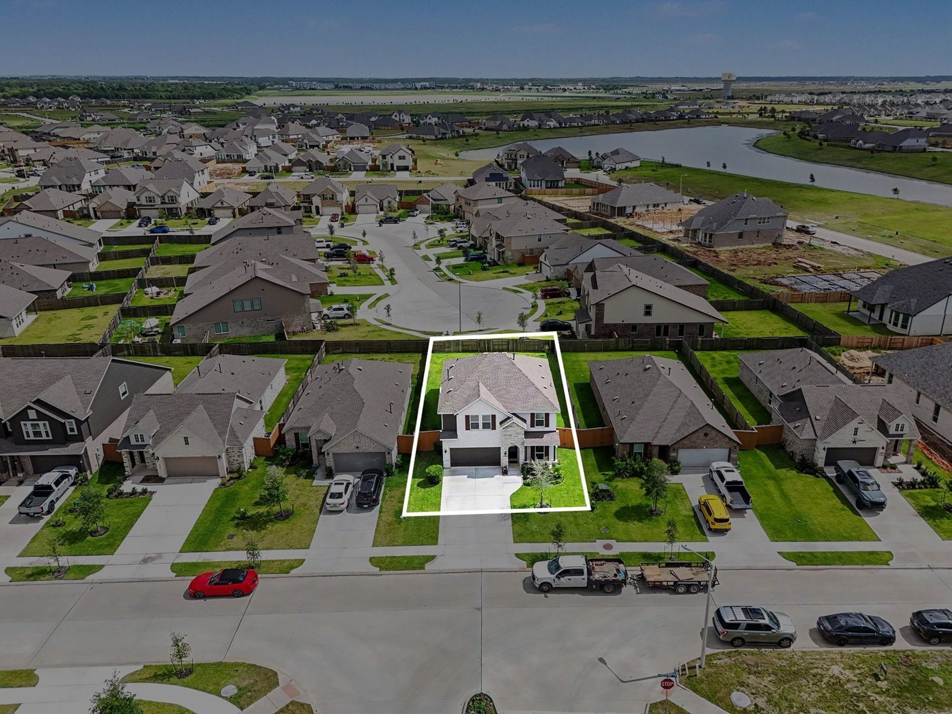 13716 Windward Mist Drive, La Marque, TX 77568 Lot line overlay clearly outlining the property boundaries and generous backyard space.