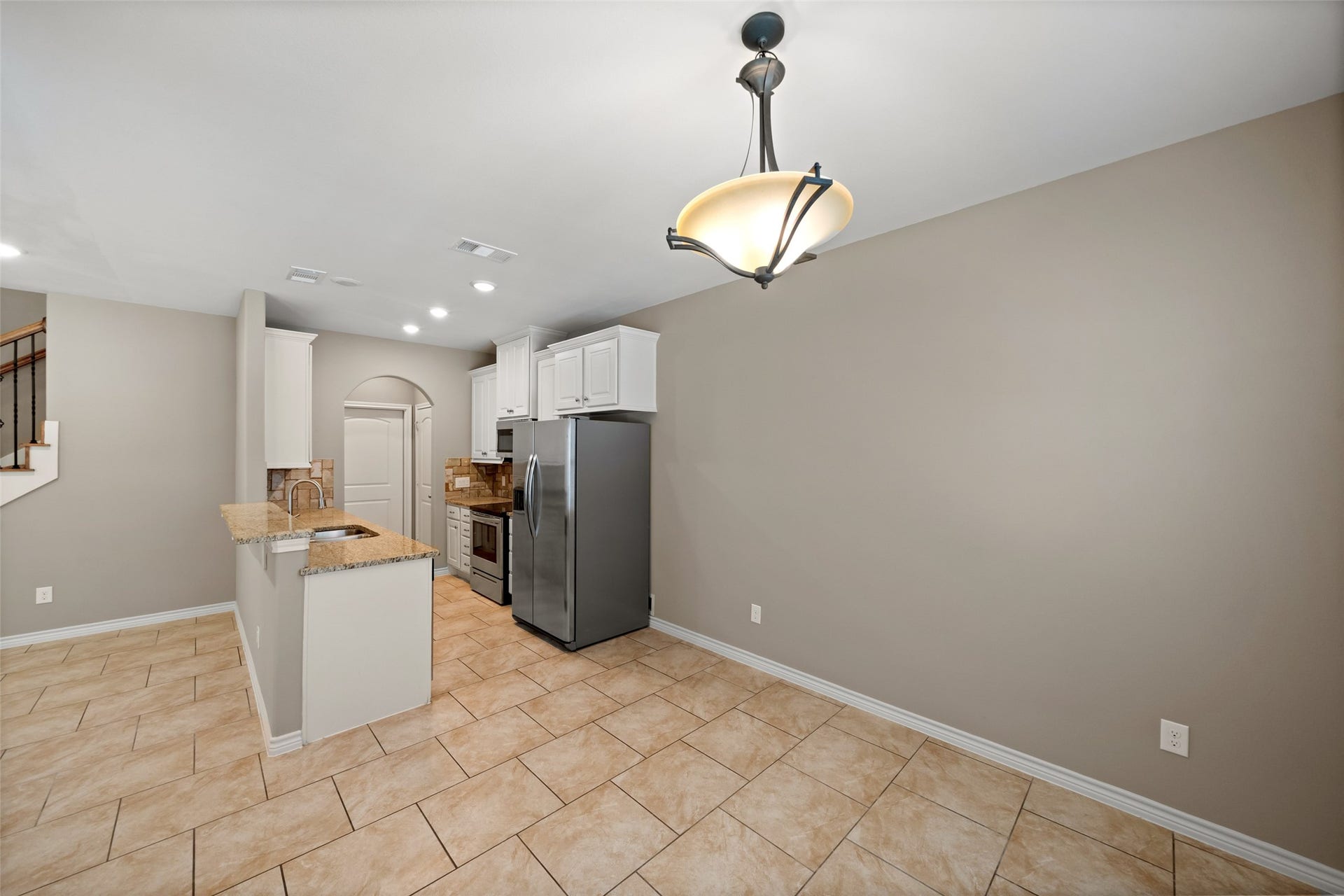 View of the kitchen from the dining area.
