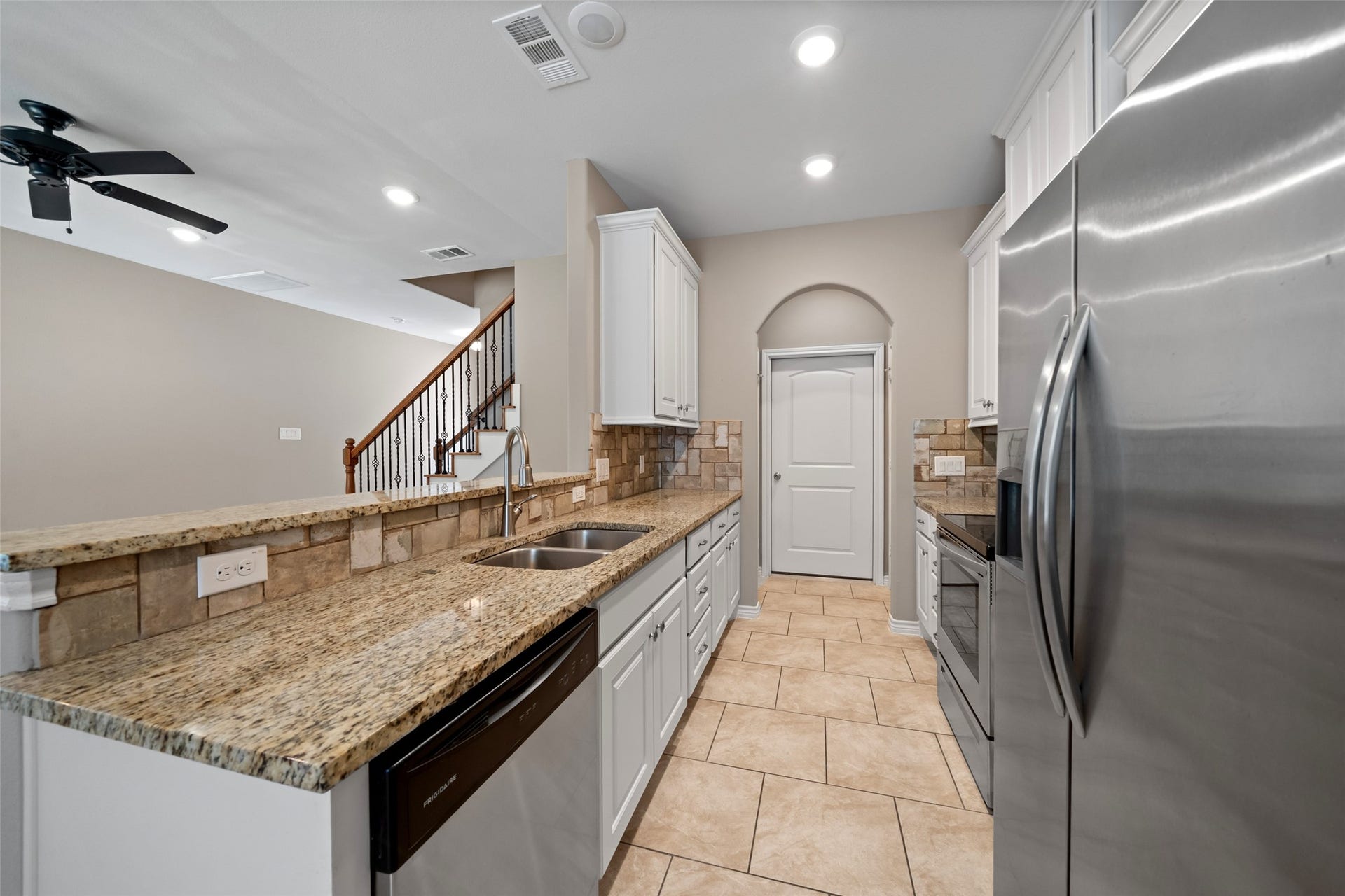 Kitchens have granite counters, stainless appliances, nice pantry space, fridges, plus a storage closet.